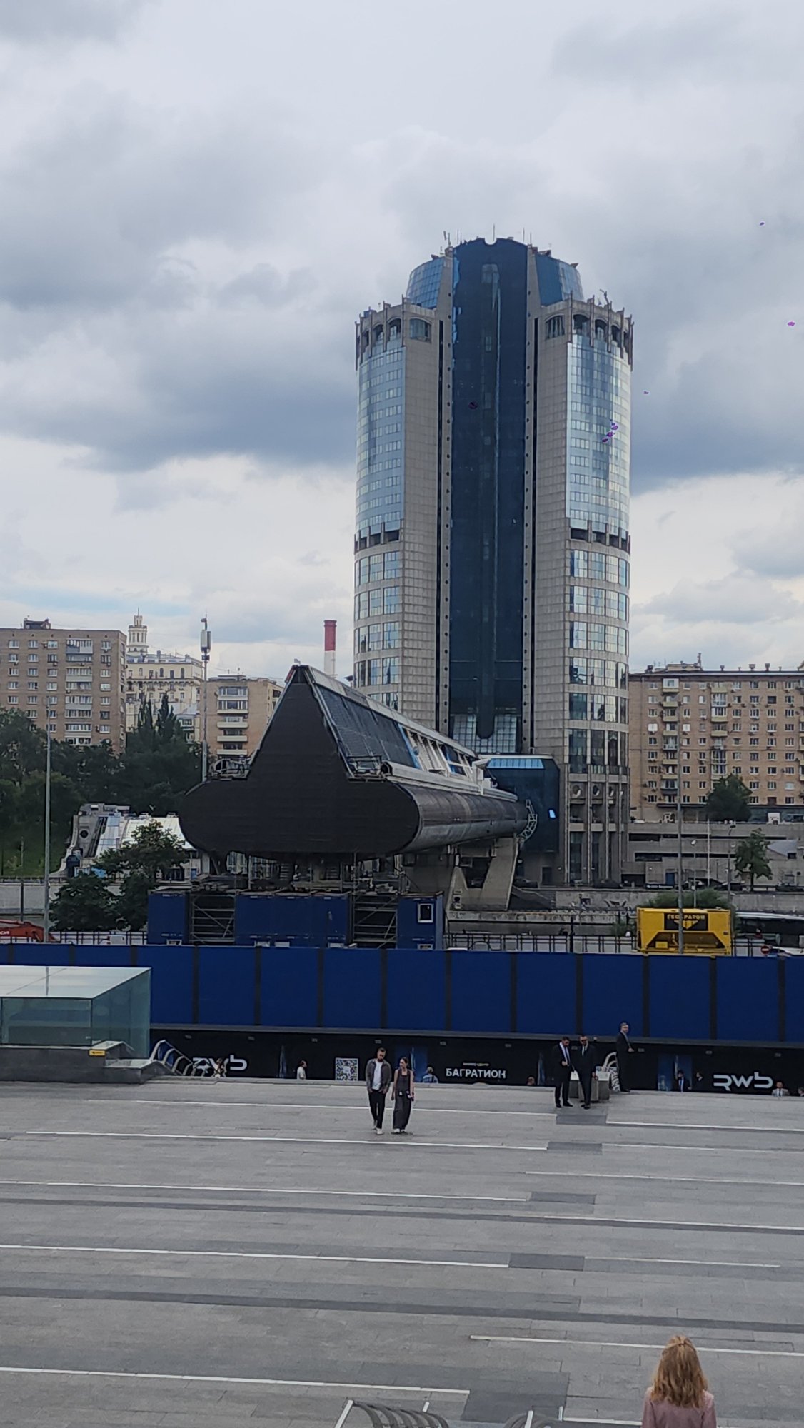 Moscow's glass towers from street level on a grey afternoon