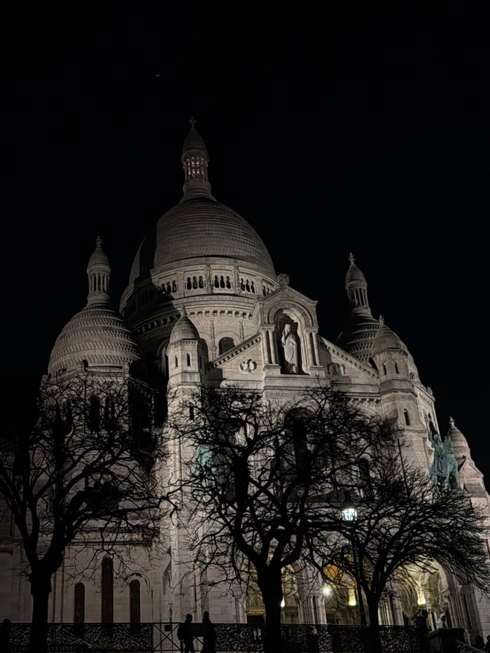 Evening gatherings near Sacré-Cœur captured in fragmented Paris memories