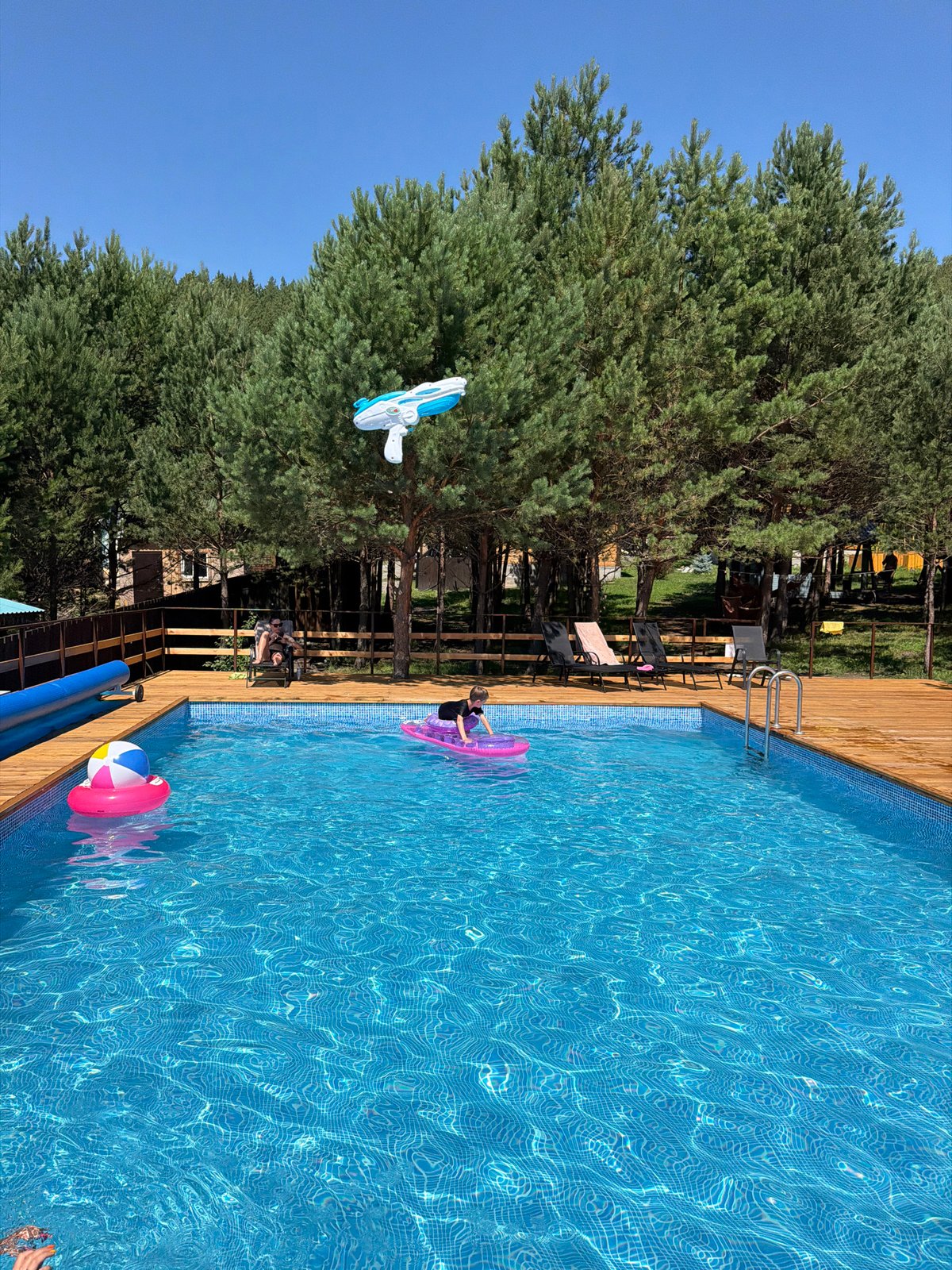 Summer pool day at a backyard setup in Elekmonar, Altai