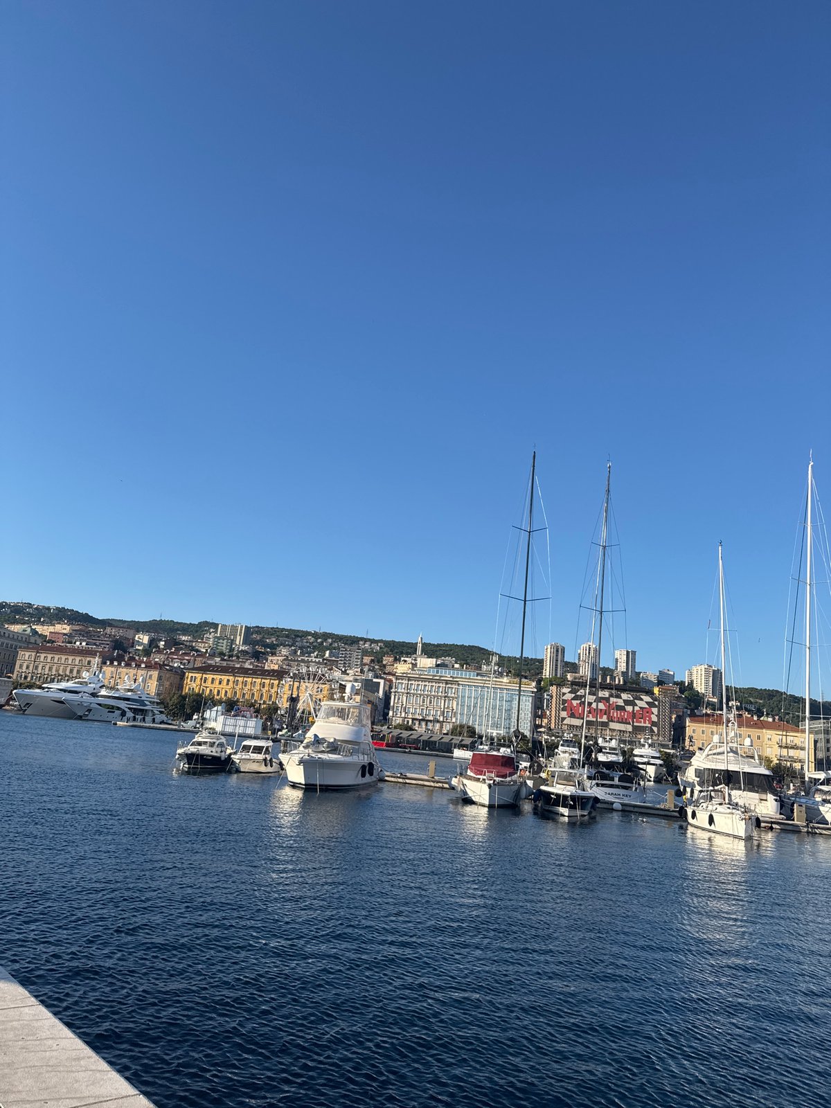 Clear skies over busy marina in Rijeka, Croatia