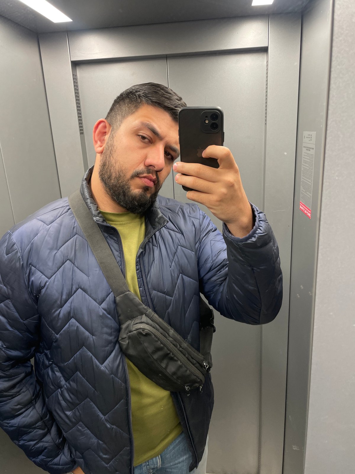 Man Takes Selfie in Elevator in Krasnoyarsk