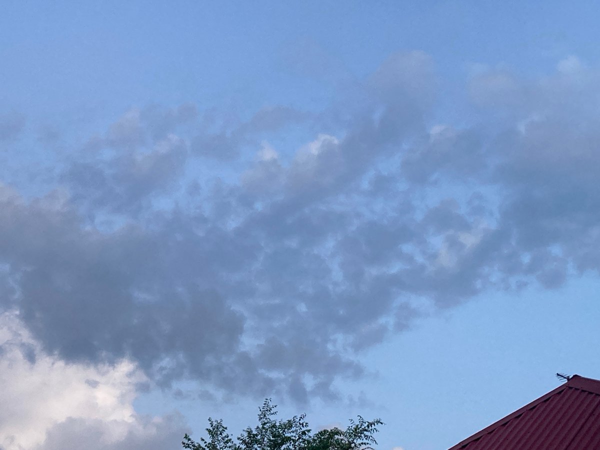 Dusk settles over a quiet Russian village in summer