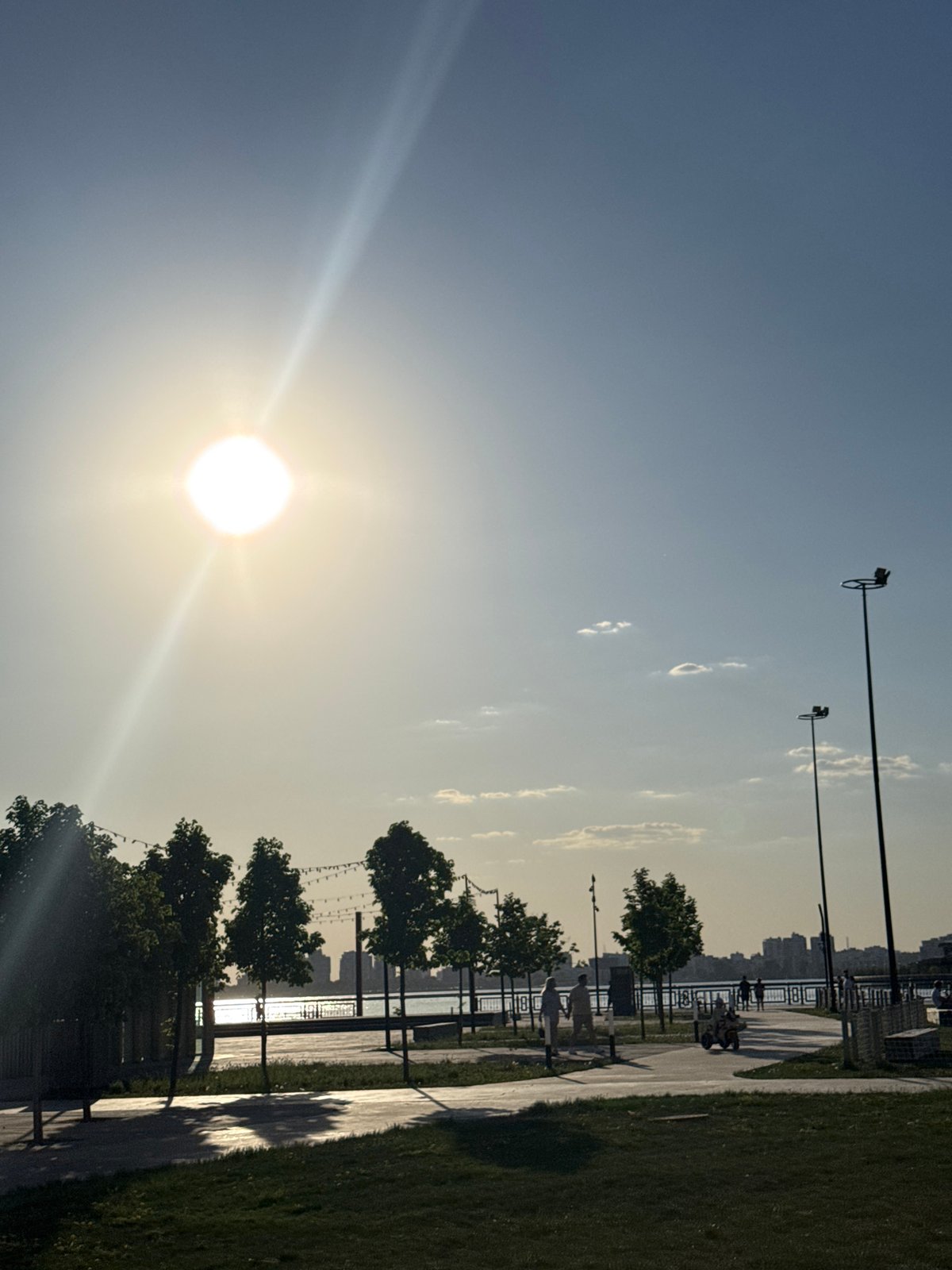 Sunny afternoon scenes captured along Kazan's waterfront and Millennium Bridge