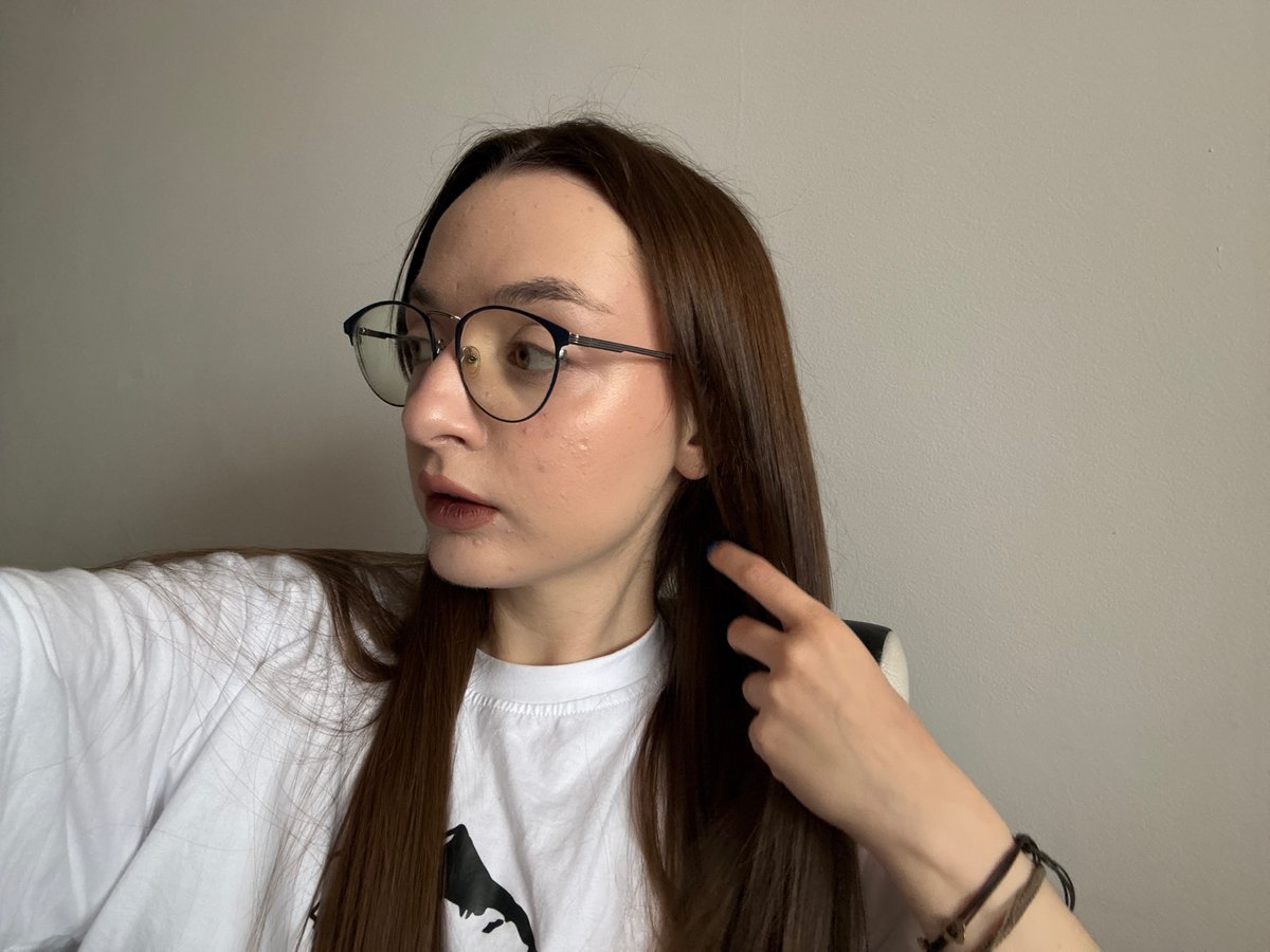 Young woman takes indoor selfie in Kragujevac, Serbia