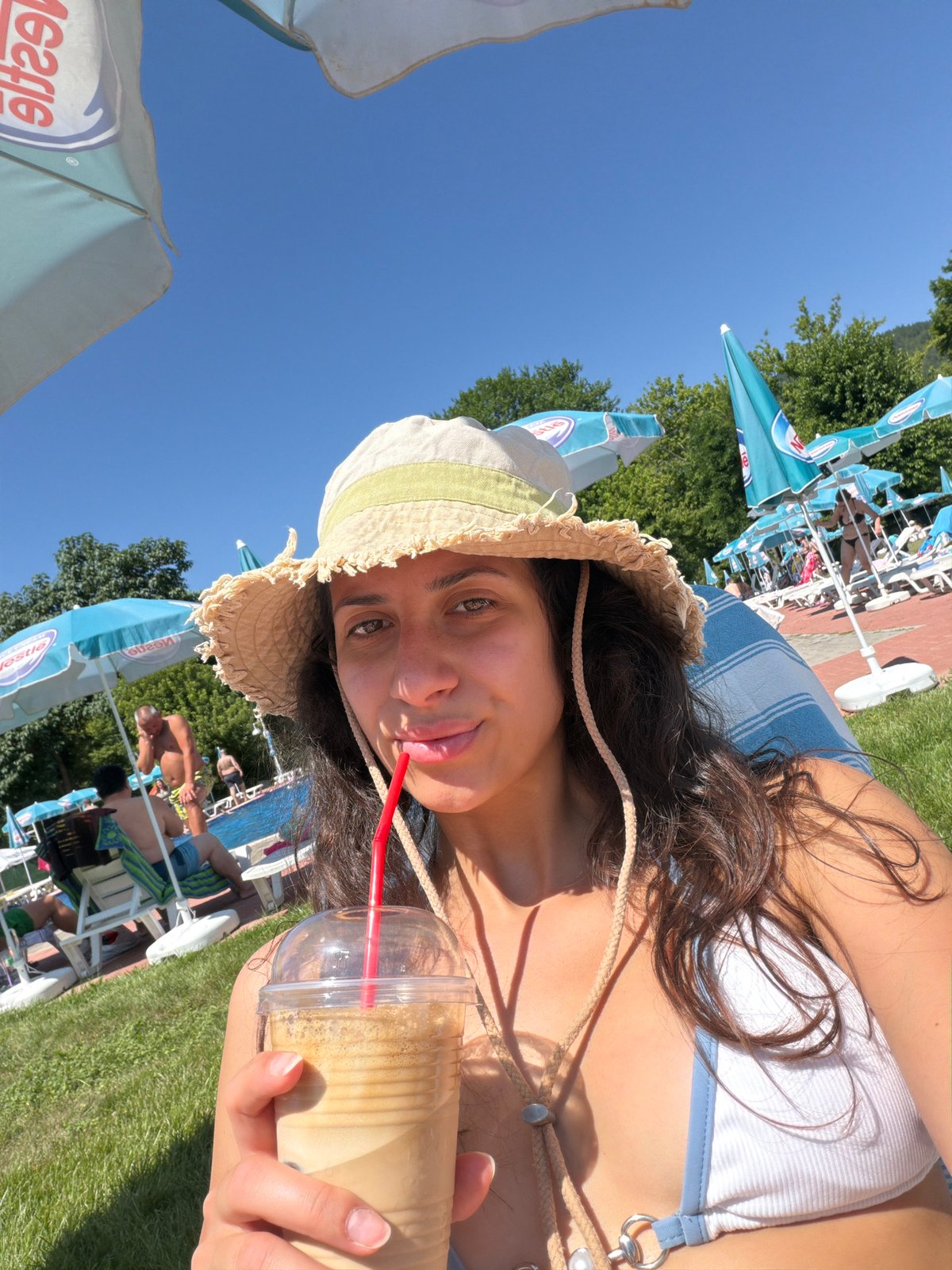 Poolside summer morning at a resort in Simitli, Bulgaria