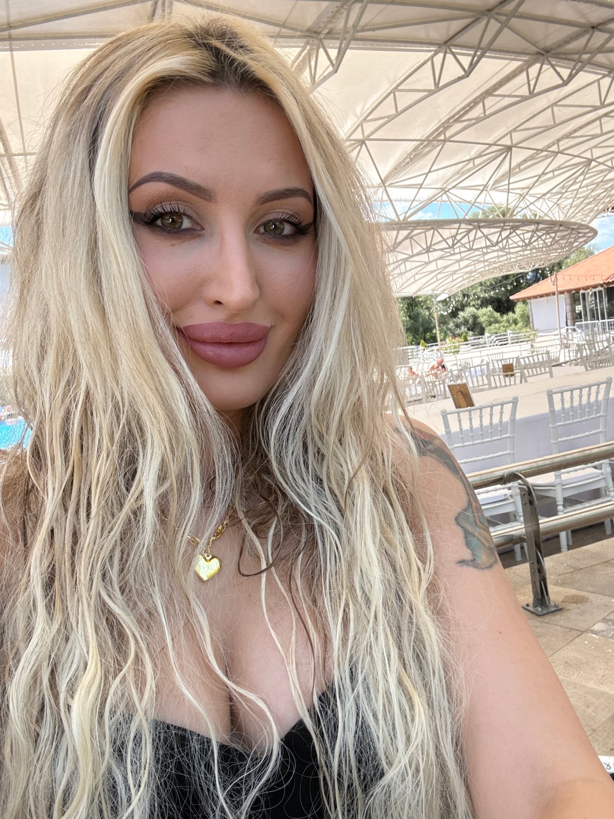 Selfies and scenes from a sunny waterfront pool venue