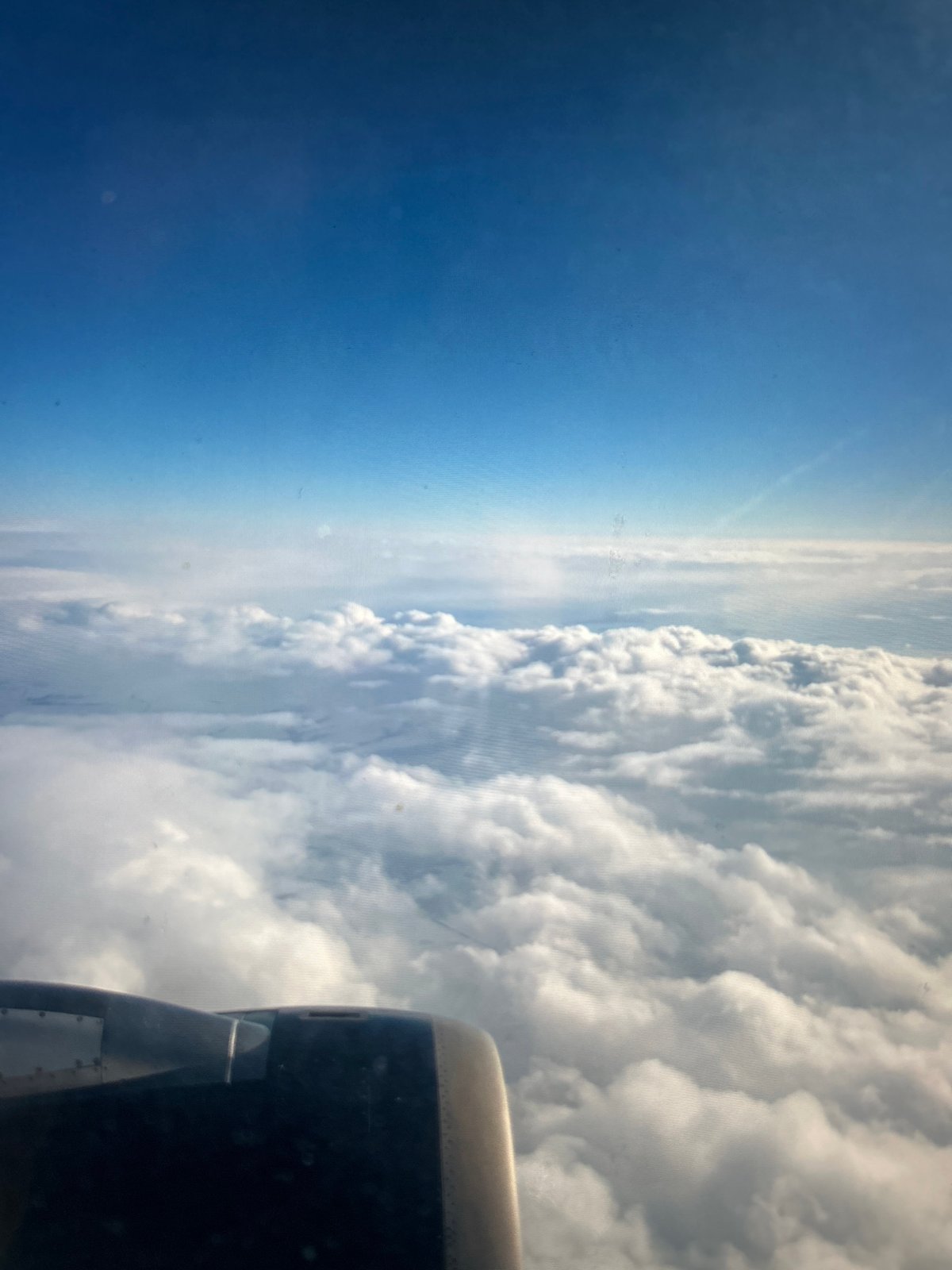 In-flight views: cabin life and clouds from above