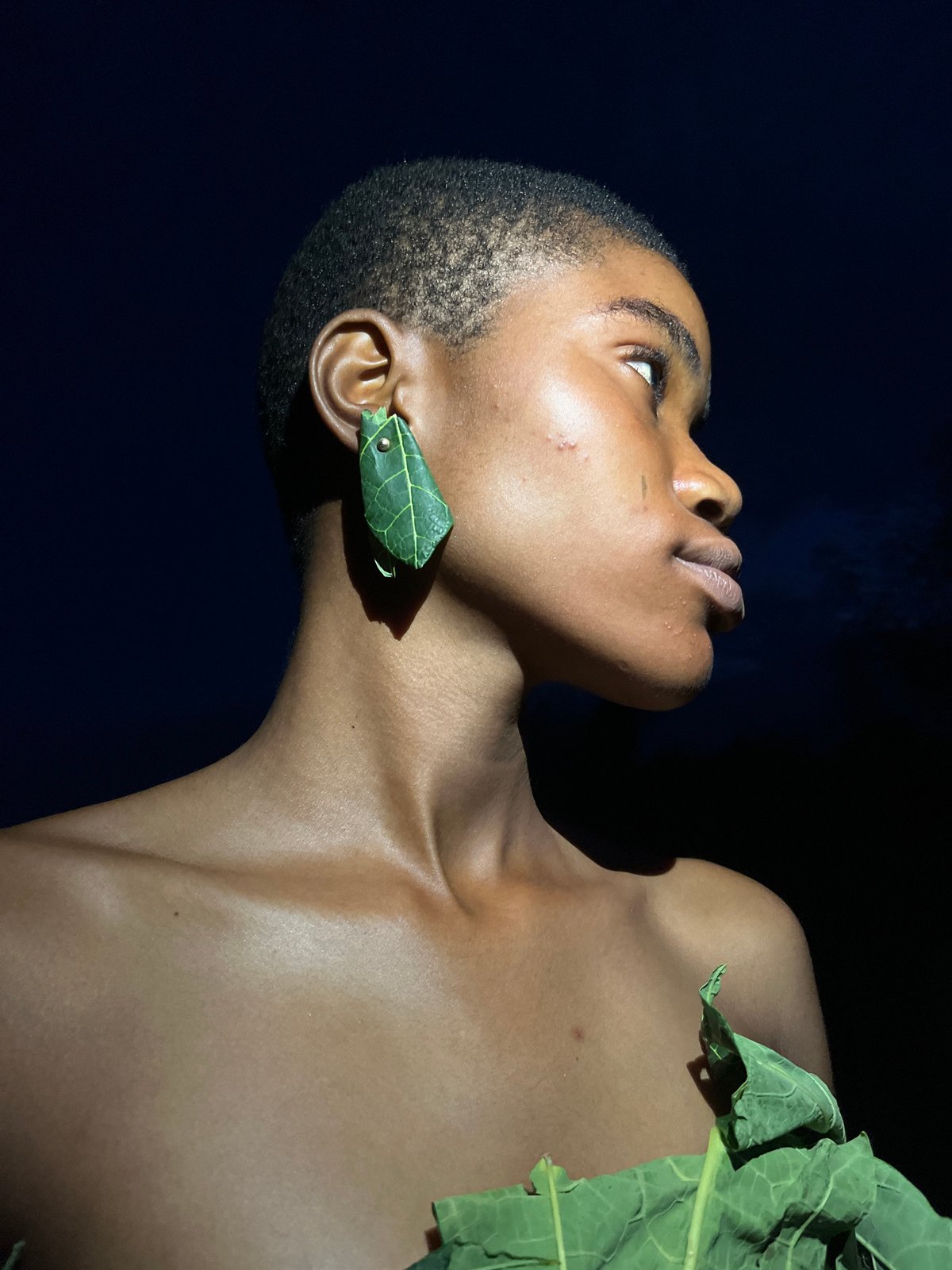 Creative leaf fashion shoot captured in Badagry, Nigeria