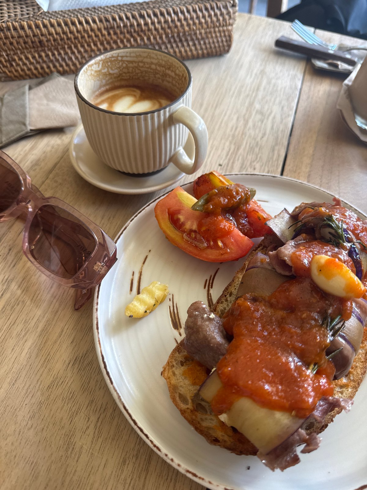Cafe visit documented through multiple interior shots and food