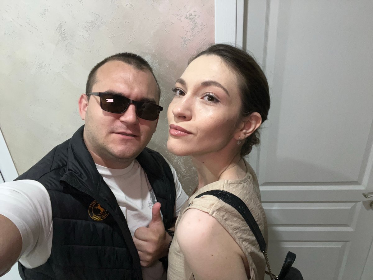 Couple documents morning outing with gray Kia in Bulgaria
