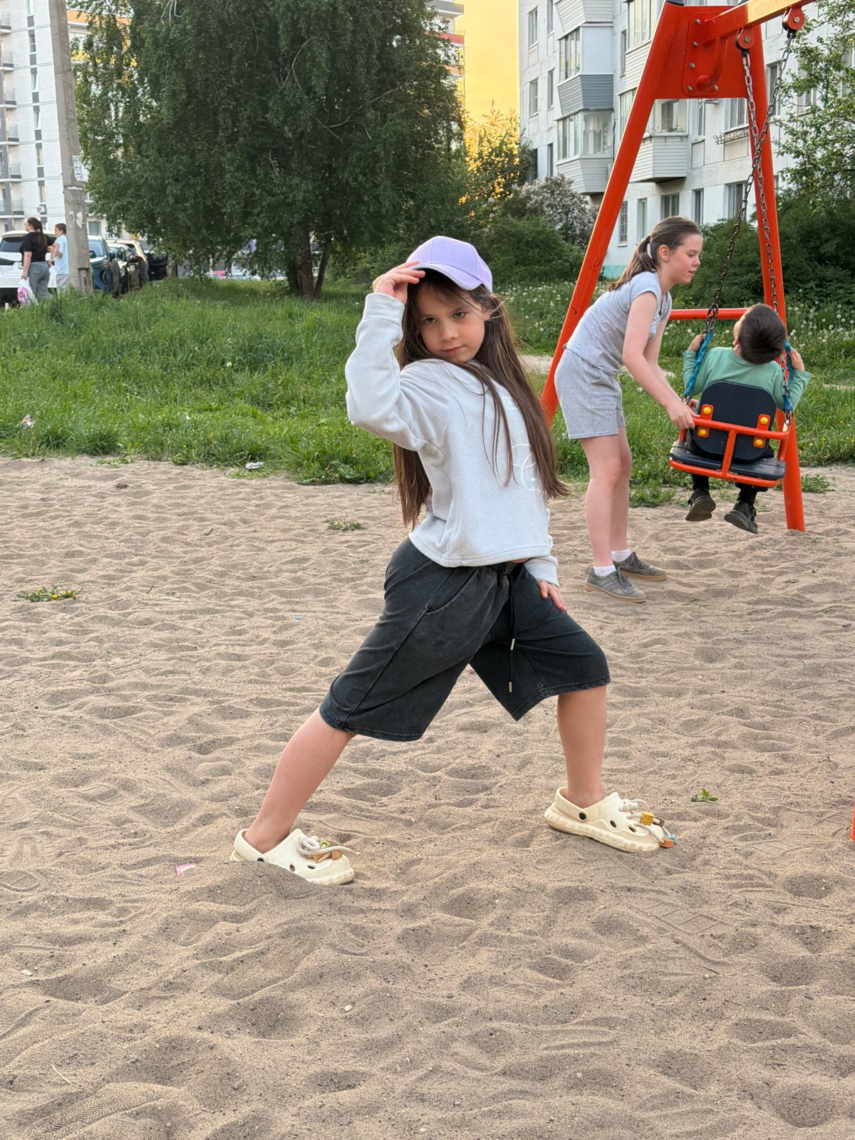 Families enjoy afternoon playground time in Chaikovsky, Russia