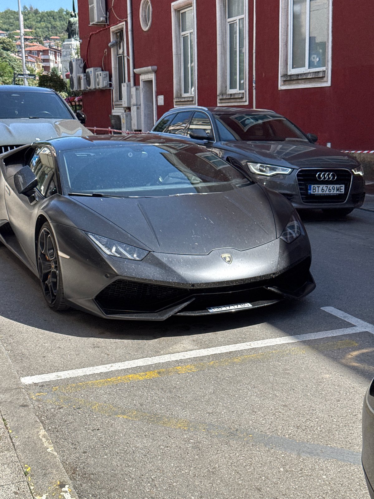 Lamborghini and Audi parked on a Veliko Tarnovo street
