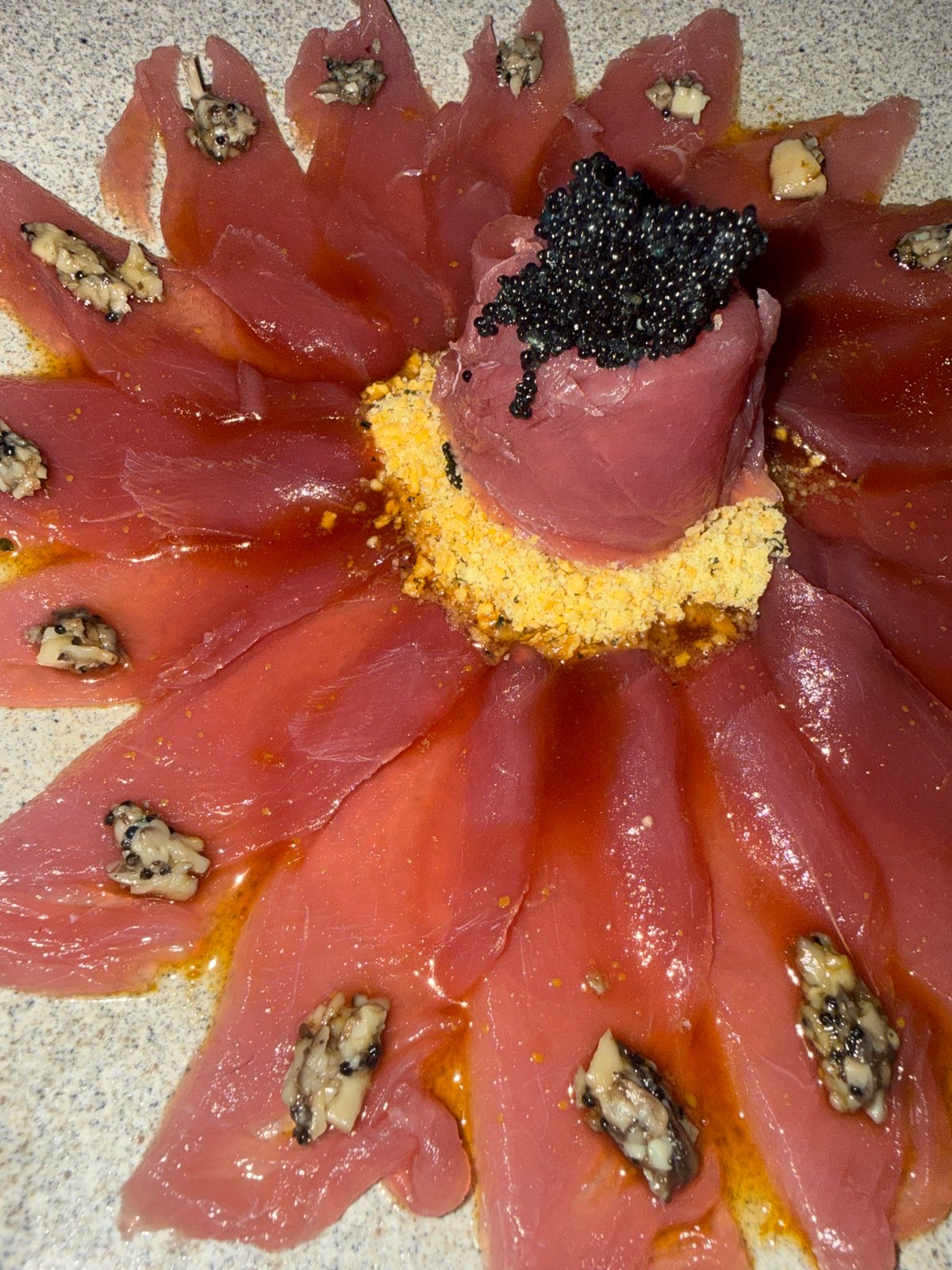 Gourmet tuna sashimi plated flower-style in Kuta Selatan