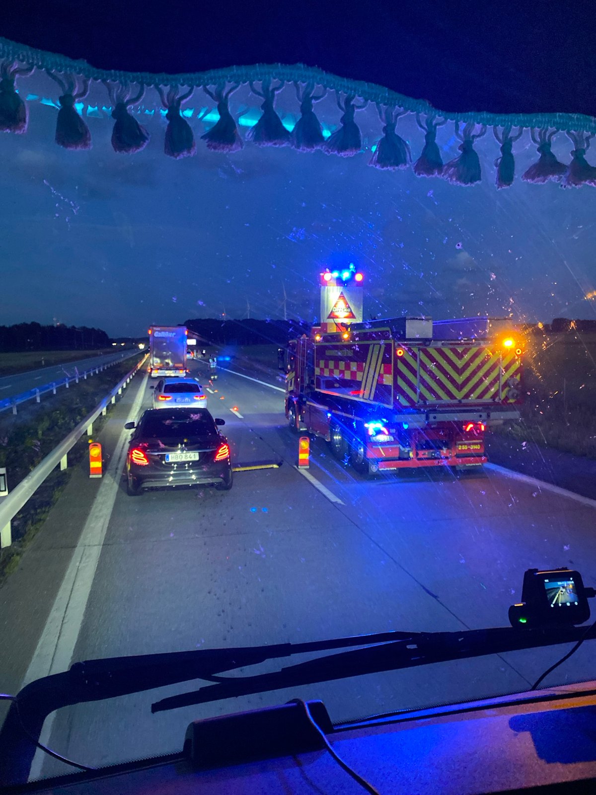 Fire truck and police on E6 highway near Långås at night