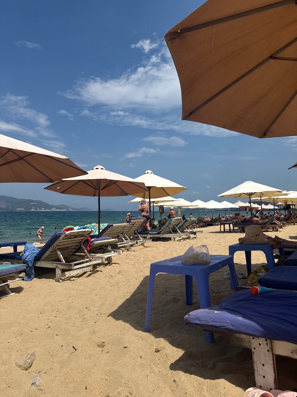 Early morning beach life at Nha Trang, vendors and all