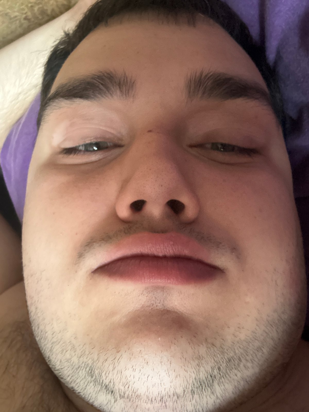 Close-up selfie session from a bedroom, July 2026