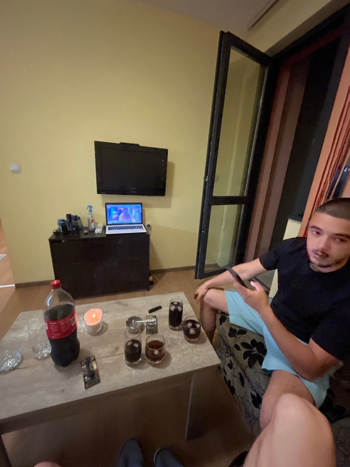 Two men gather for casual evening at Plovdiv residence
