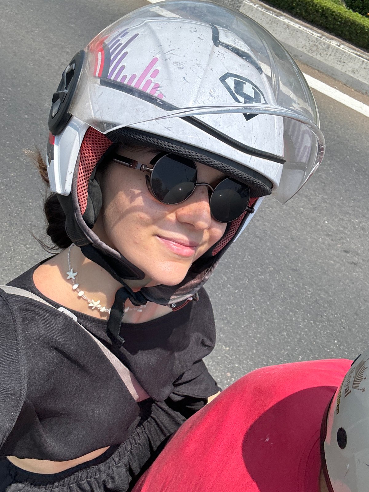 Two motorcyclists spotted on road in Phú Thủy, Vietnam