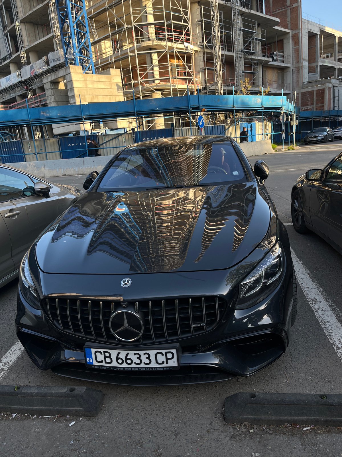 Luxury cars documented across Sofia locations during afternoon hours