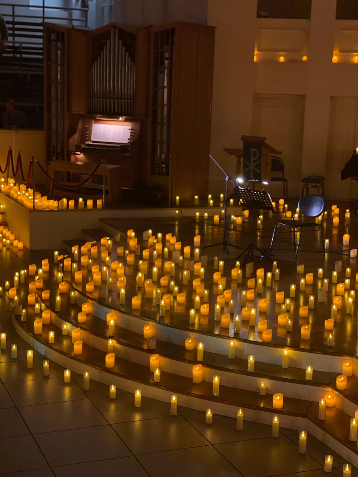 Candlelit concert fills ornate Saint Petersburg hall with flickering light