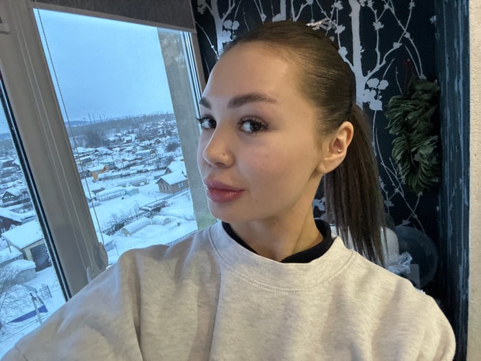 Family playtime and domestic activities documented in Chaikovsky, Russia
