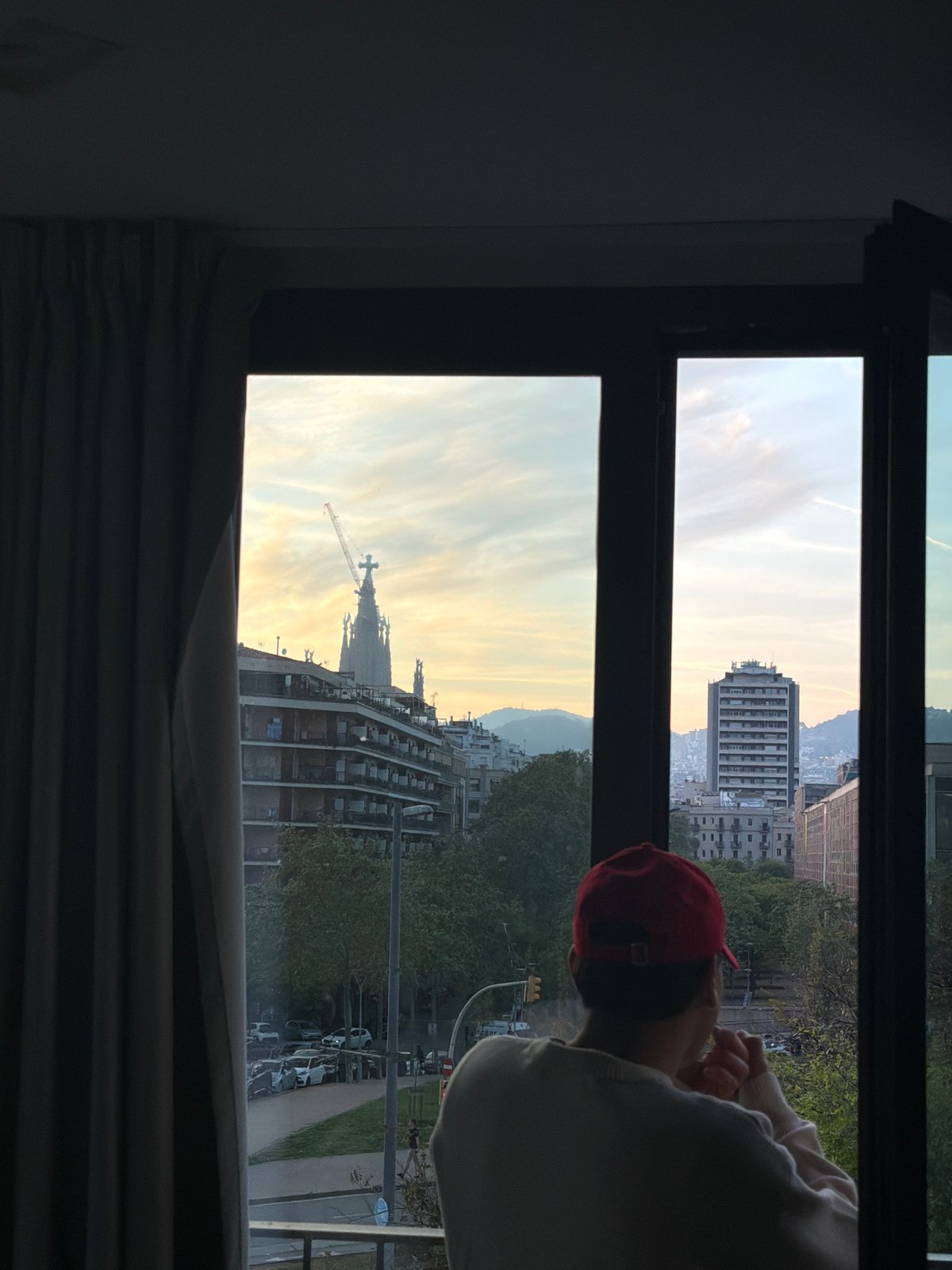 Barcelona skyline viewed through window, landmarks visible