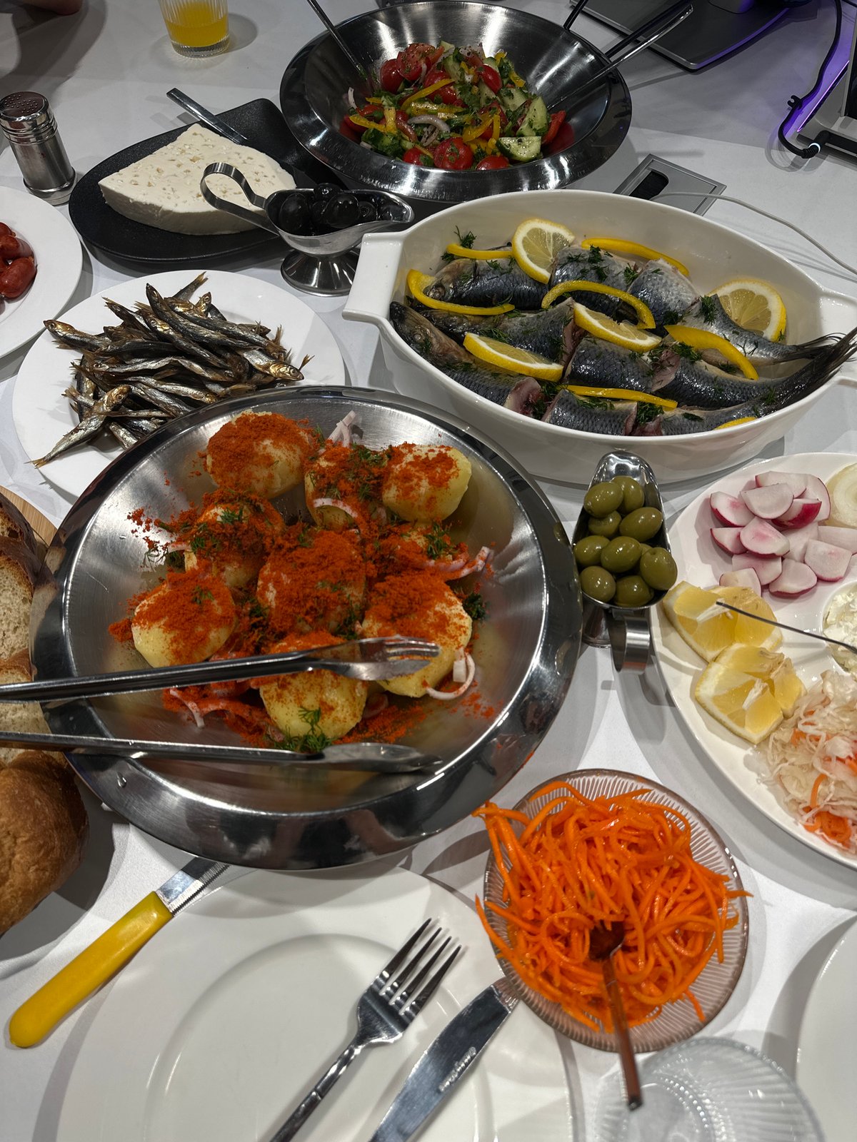 Home dinner party documented in Yerevan apartment with traditional spread