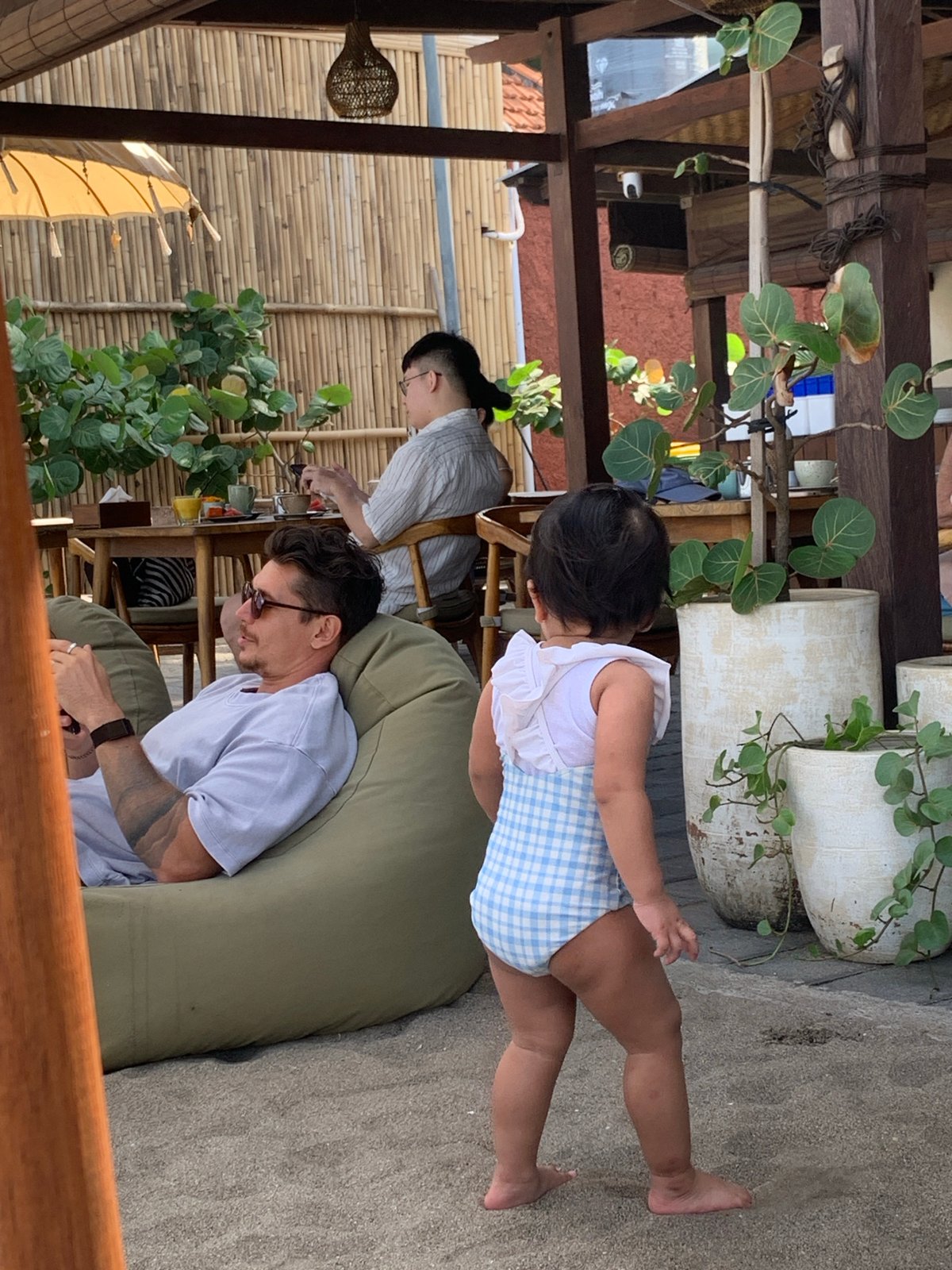 Family beach day with toddlers at a North Kuta shoreside spot