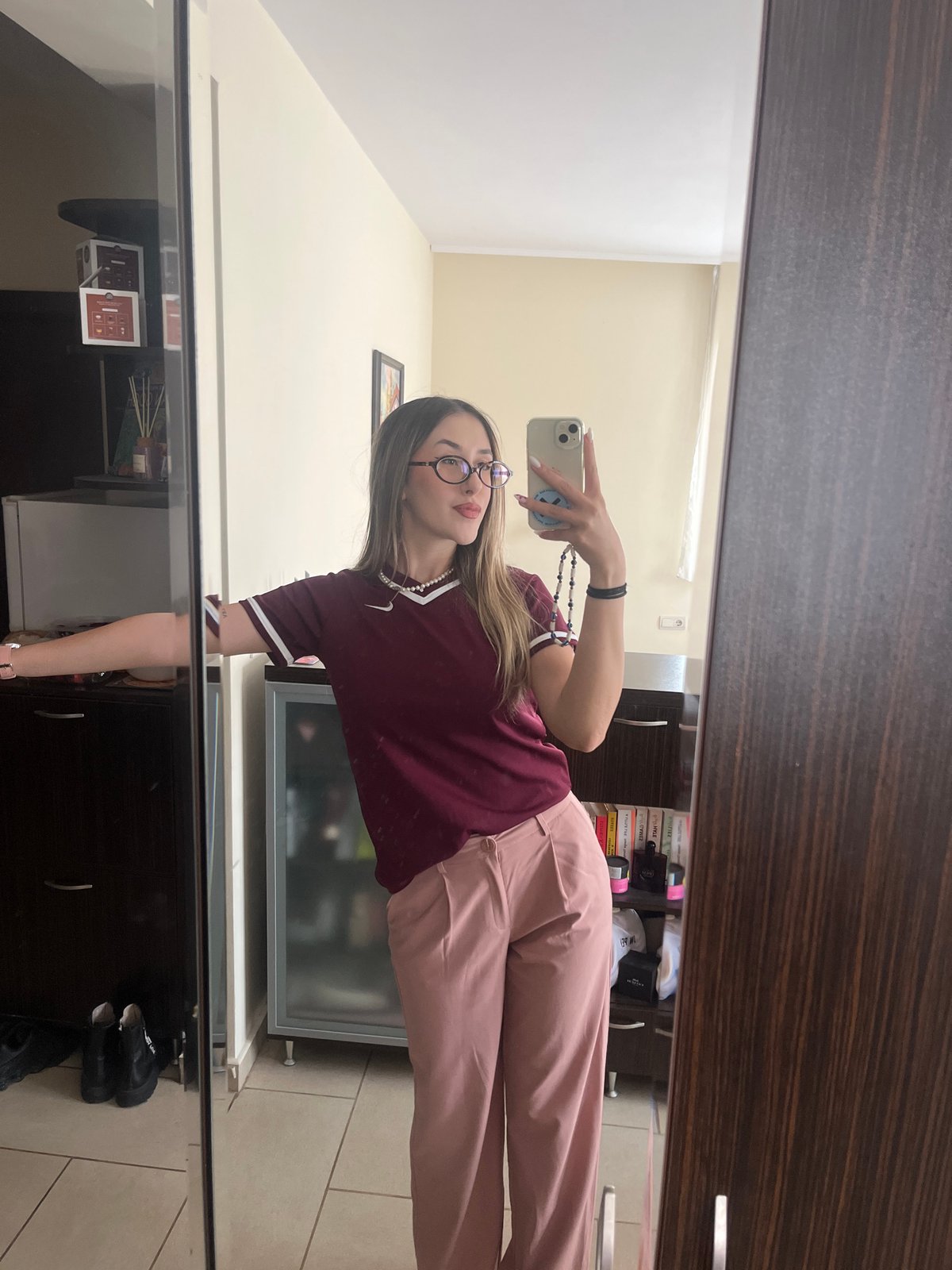 Woman documents casual day in Sofia with selfies, tower view
