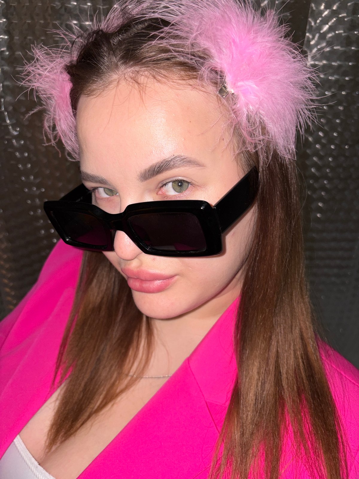 Woman poses for portrait in Krasnodar wearing pink accessories