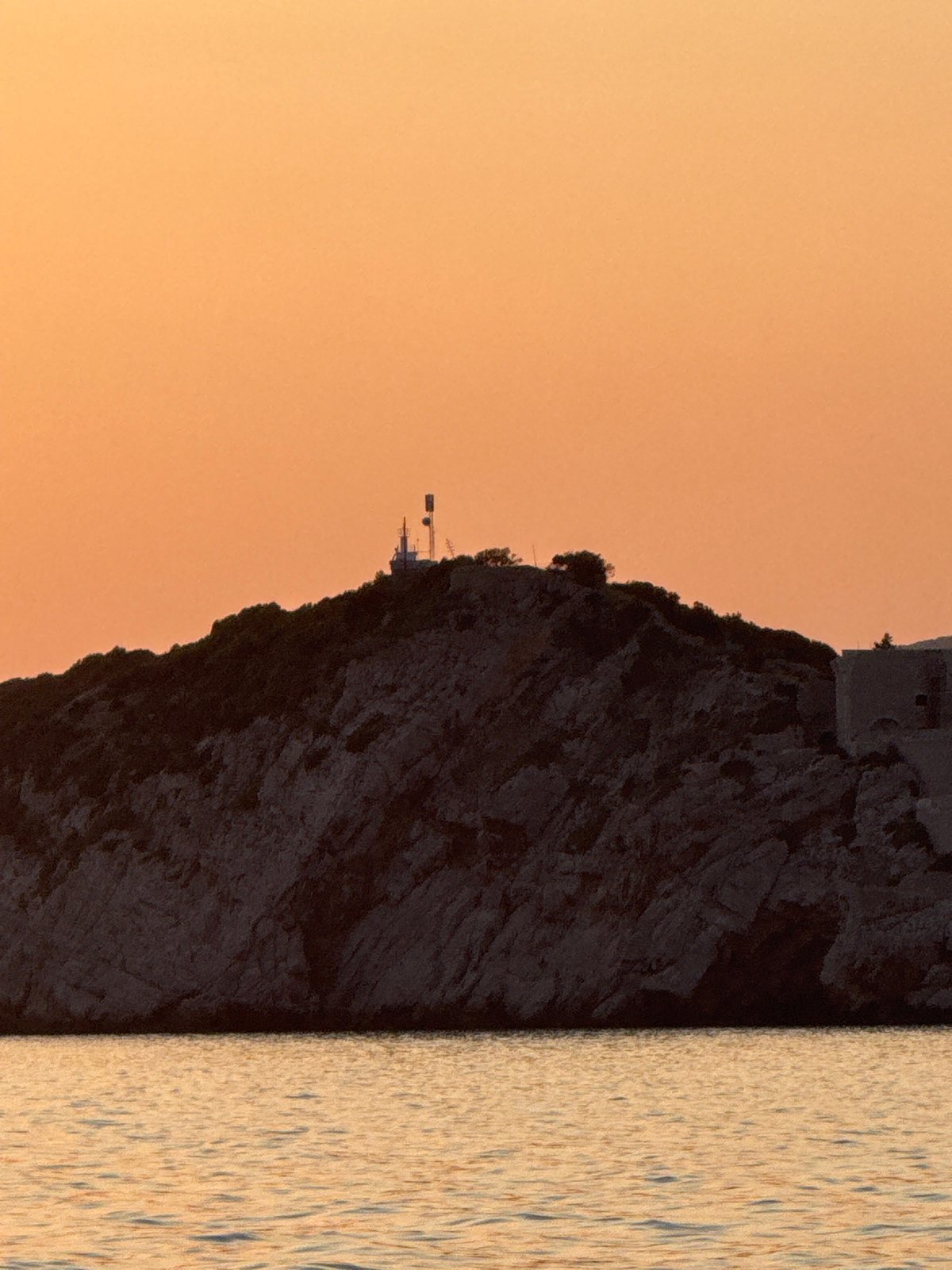 Adriatic sunset off Montenegro coast, watched from the water