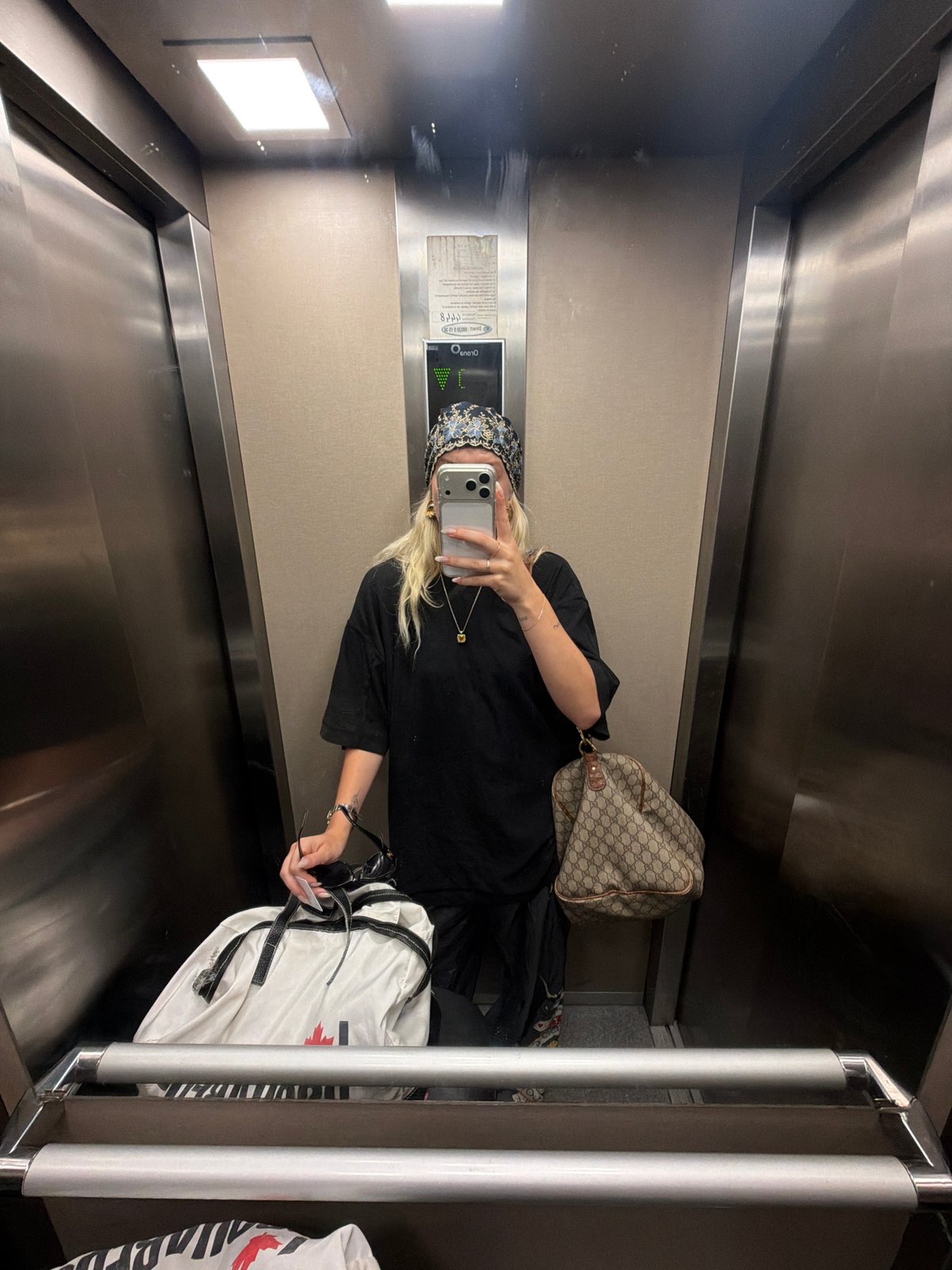 Person takes elevator selfie in Kenitra, Morocco