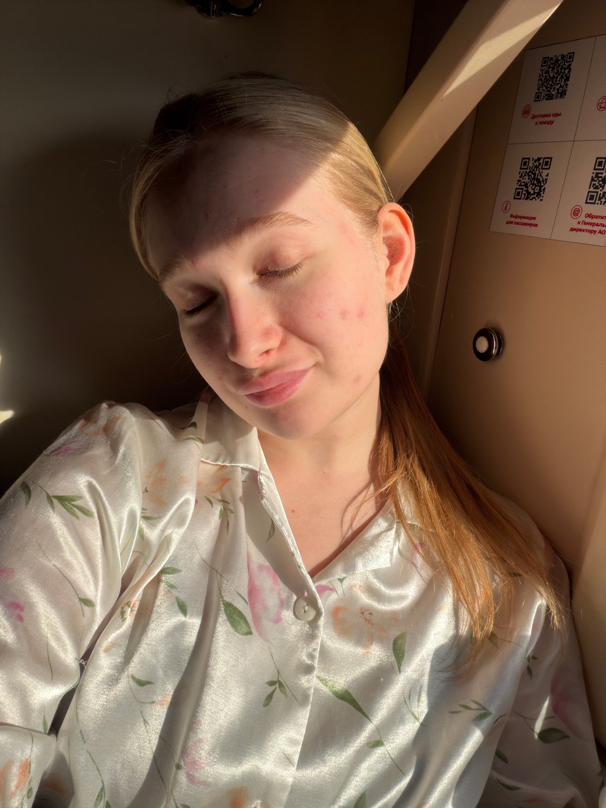 Person observed resting in train compartment in Krasnyy Sulin