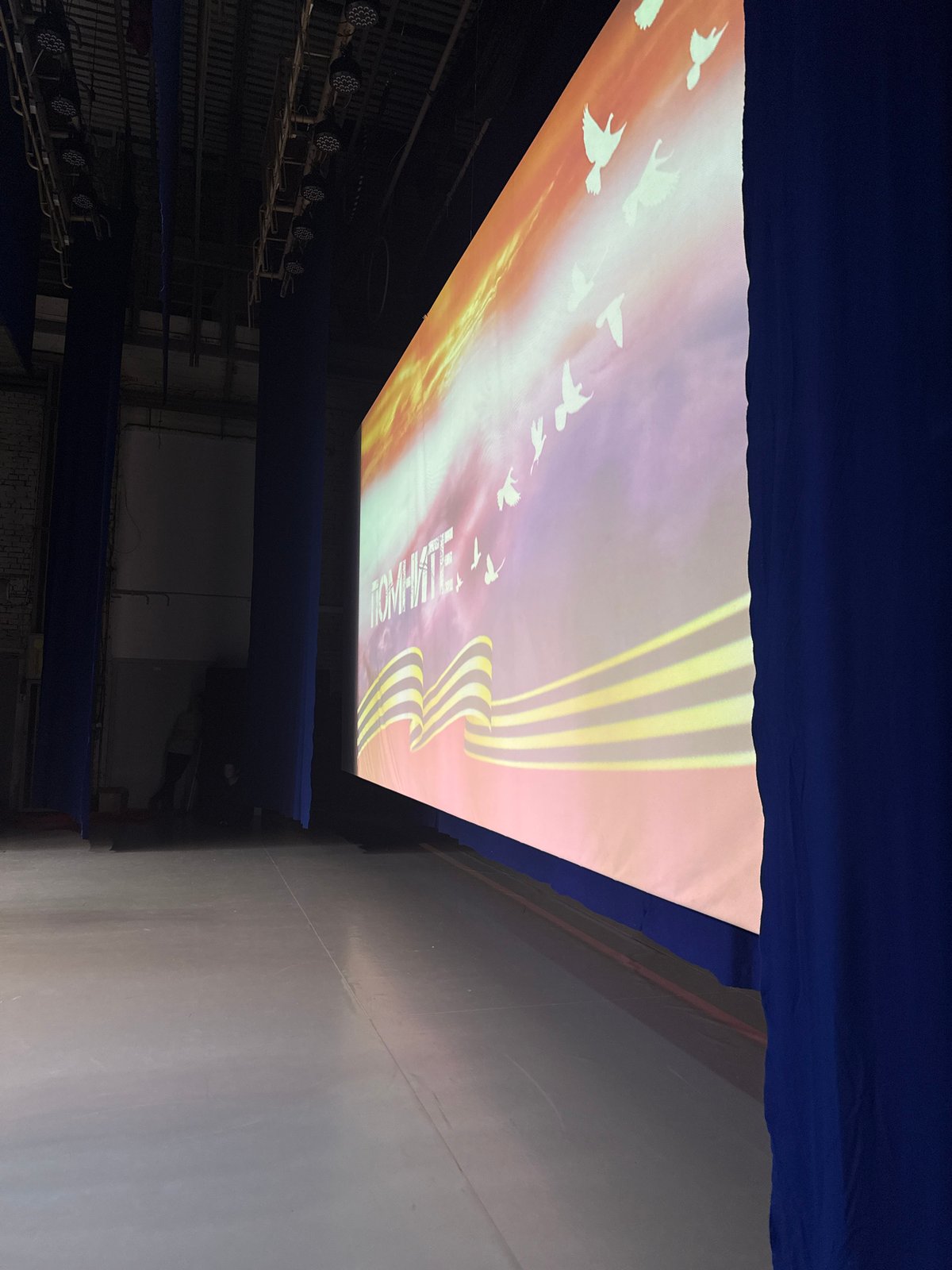 Memorial event with dove projections staged in Perm theater