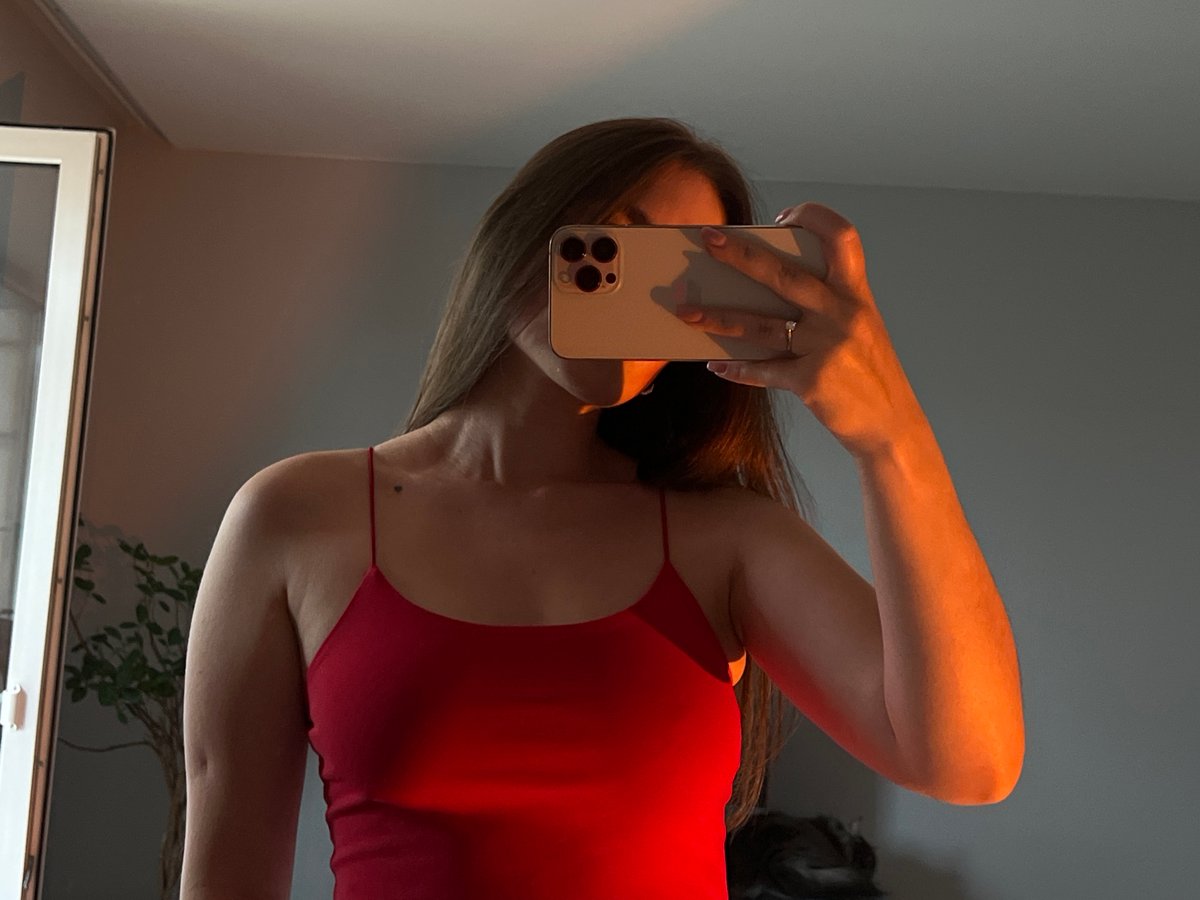 Woman takes mirror selfies in Ternopil apartment