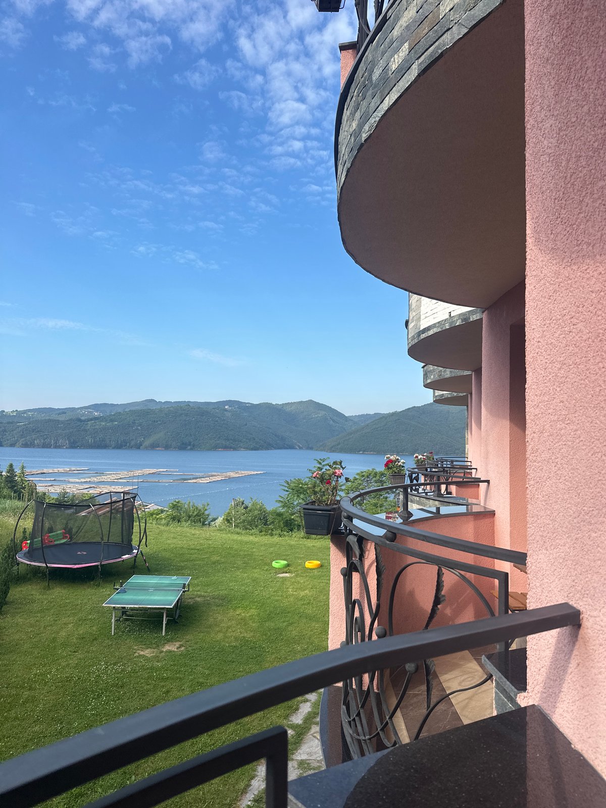 Morning balcony views captured over Bulgarian reservoir landscape