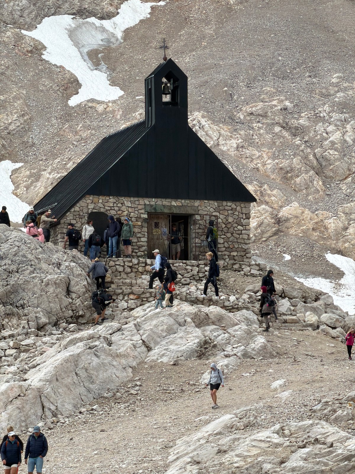 Morning at the Zugspitze summit, chapel and snowcat in view