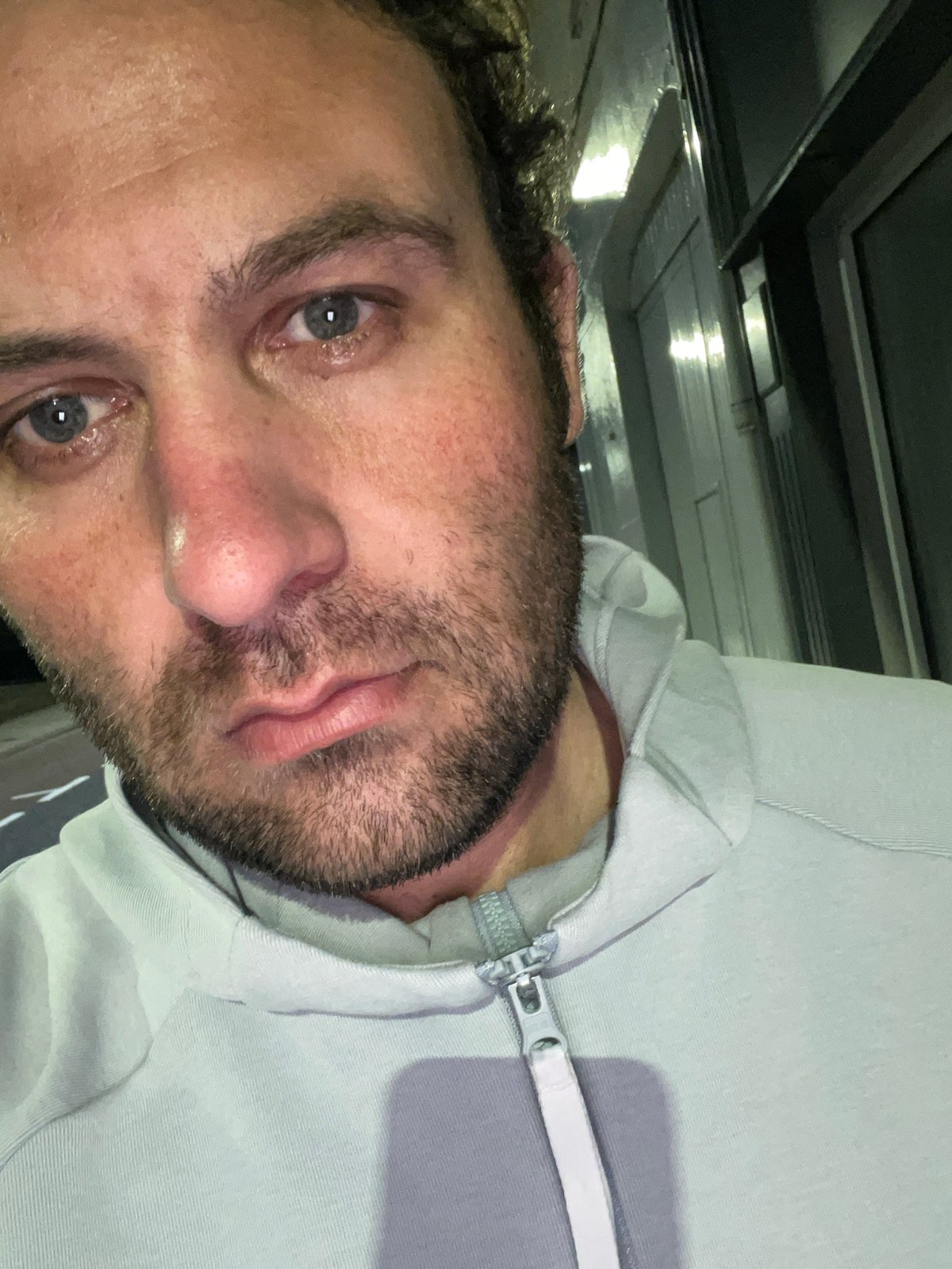 Portrait of man in hooded sweatshirt photographed in Armagh