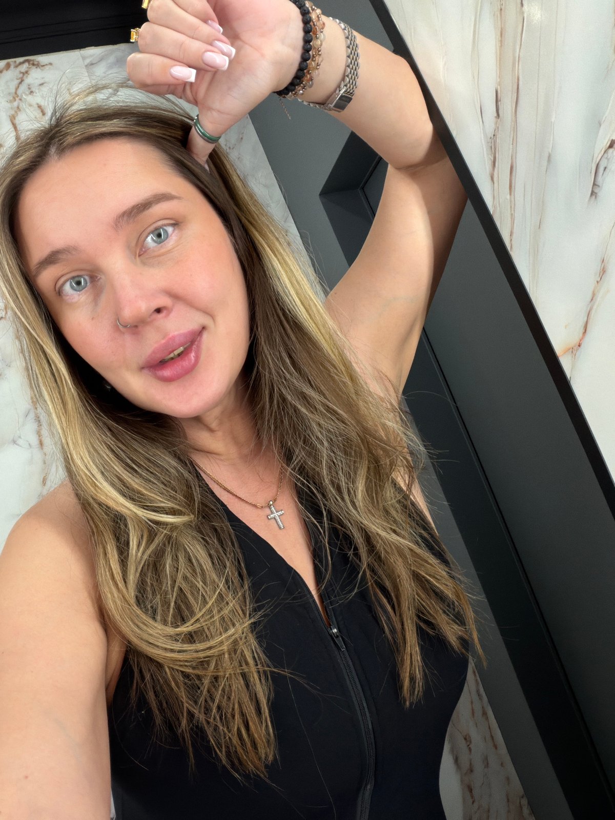 Woman photographed in marble bathroom settings in Moscow