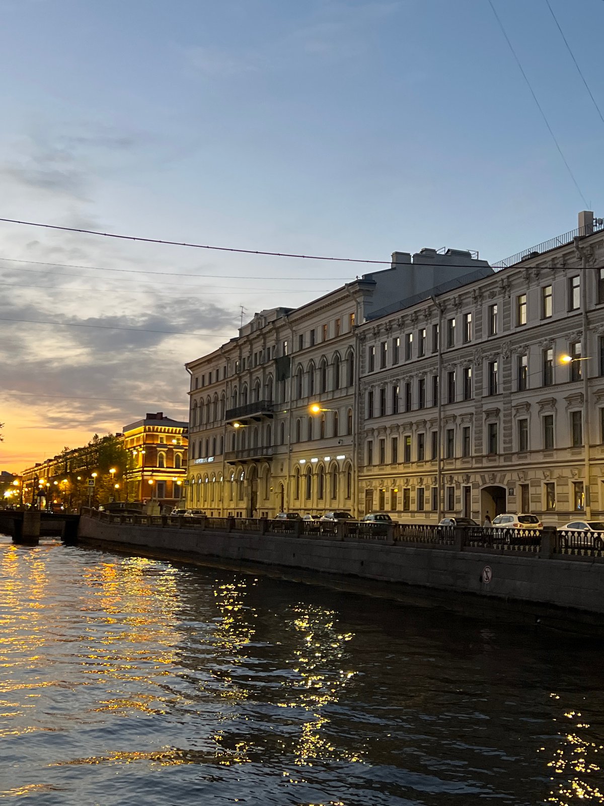Evening canal scene documented in Saint Petersburg at dusk
