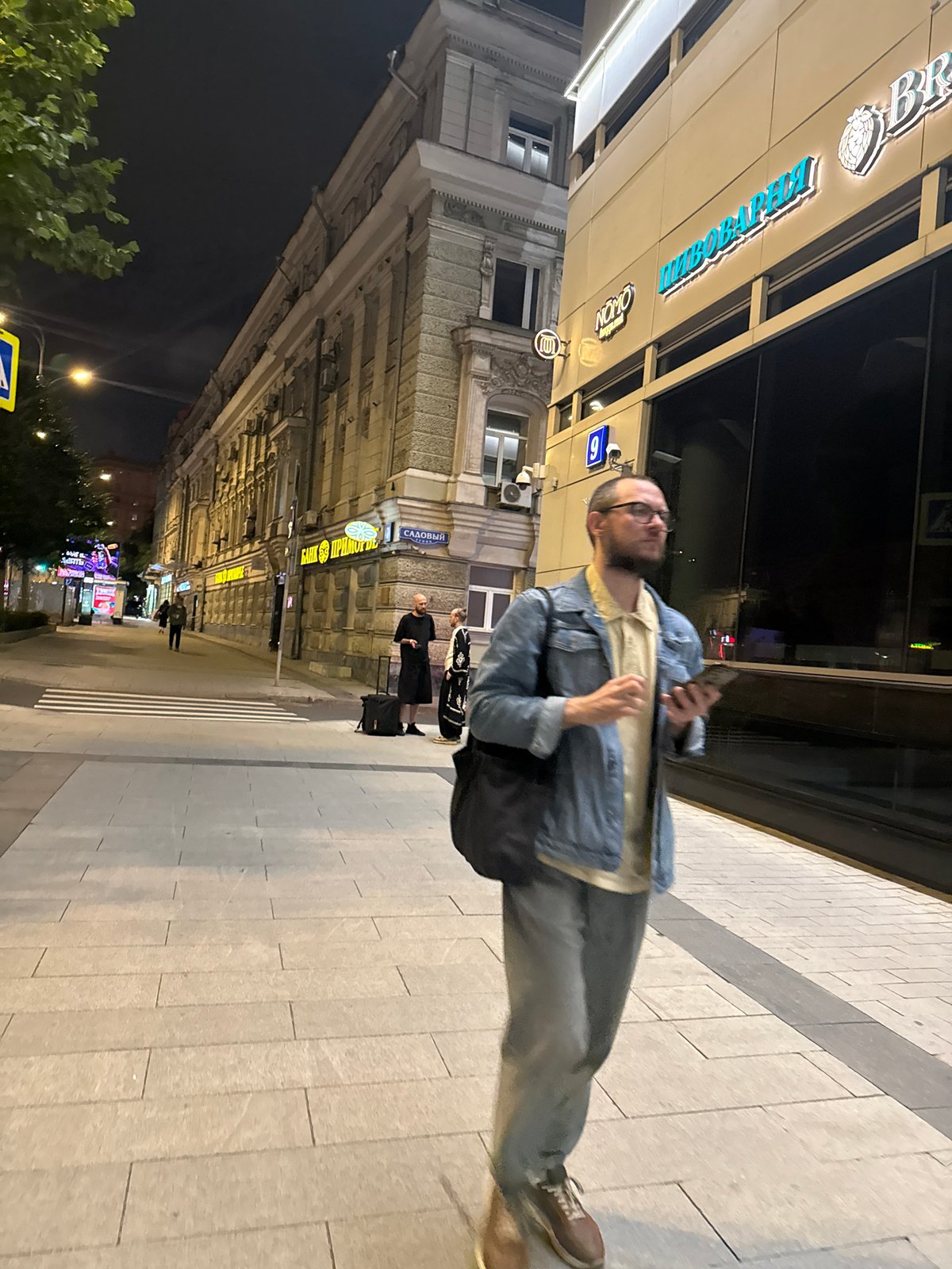 Busy Moscow street scene, summer night foot and vehicle traffic