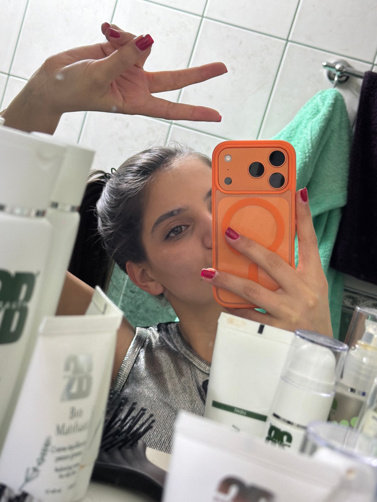 Woman takes selfie in Rudartsi, Bulgaria late evening