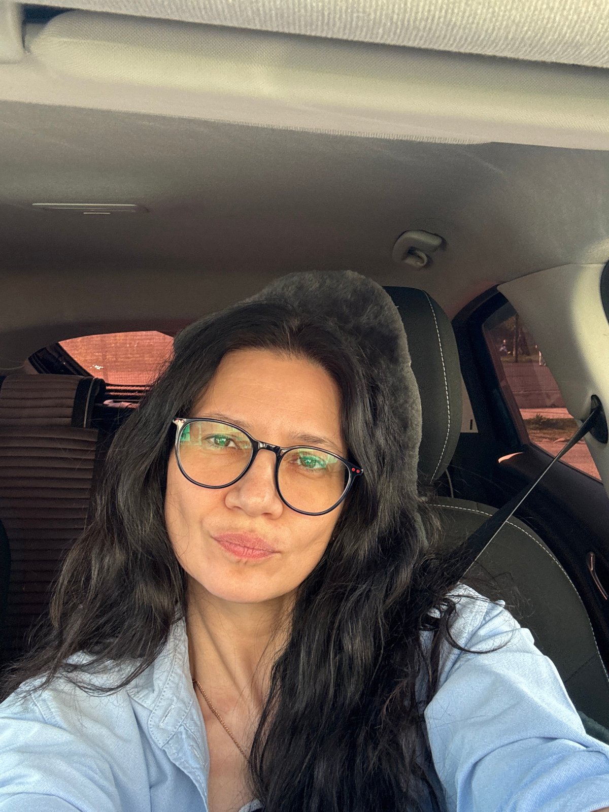 Woman documents afternoon routine in Chaikovsky with selfies and salad