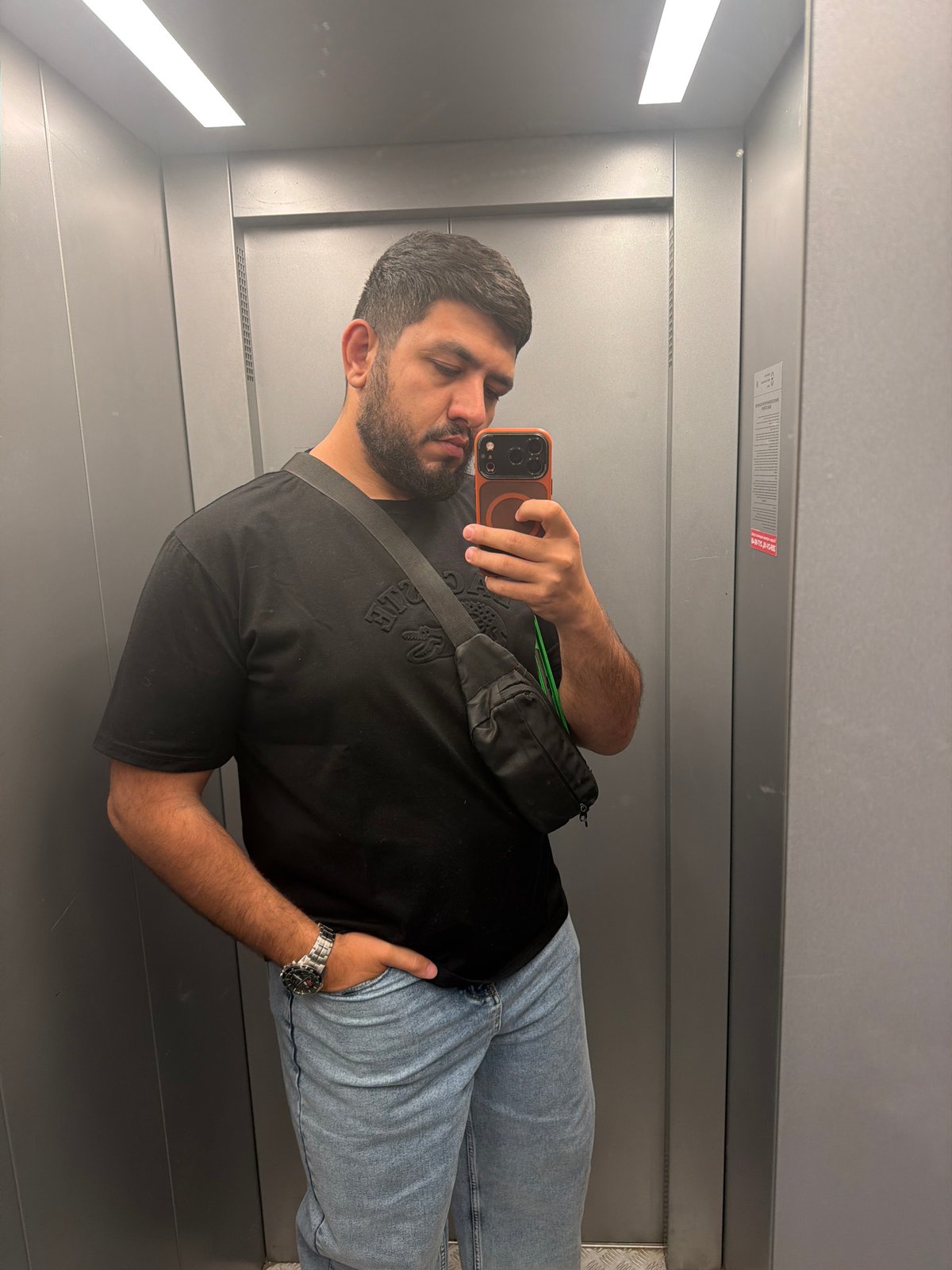 Man Takes Selfie in Elevator in Krasnoyarsk