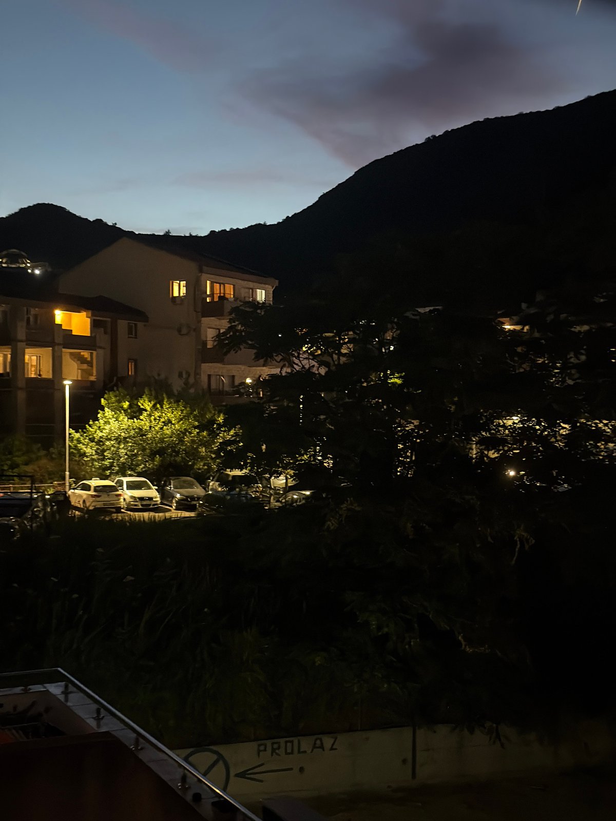 Twilight to night balcony views over Budva Montenegro