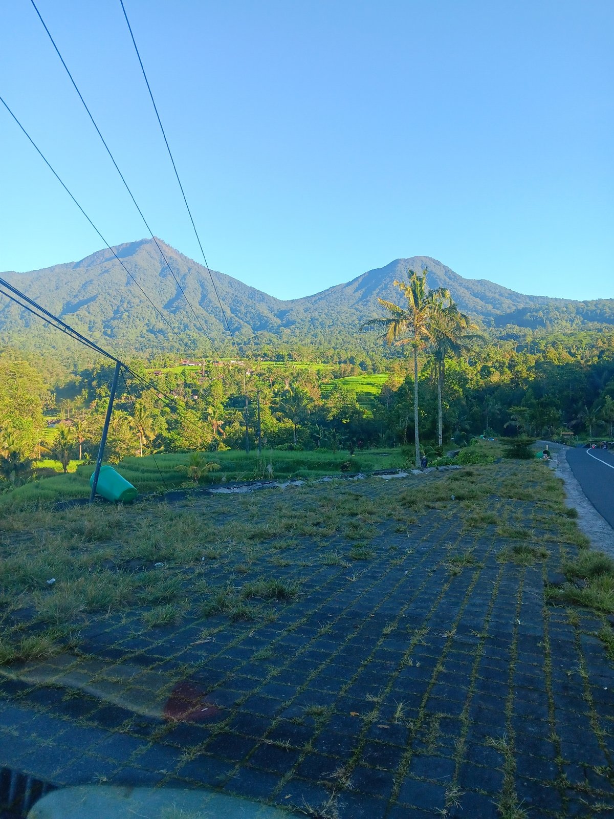 Scenic landscape photographed in Penebel, Indonesia showing mountains, terraces