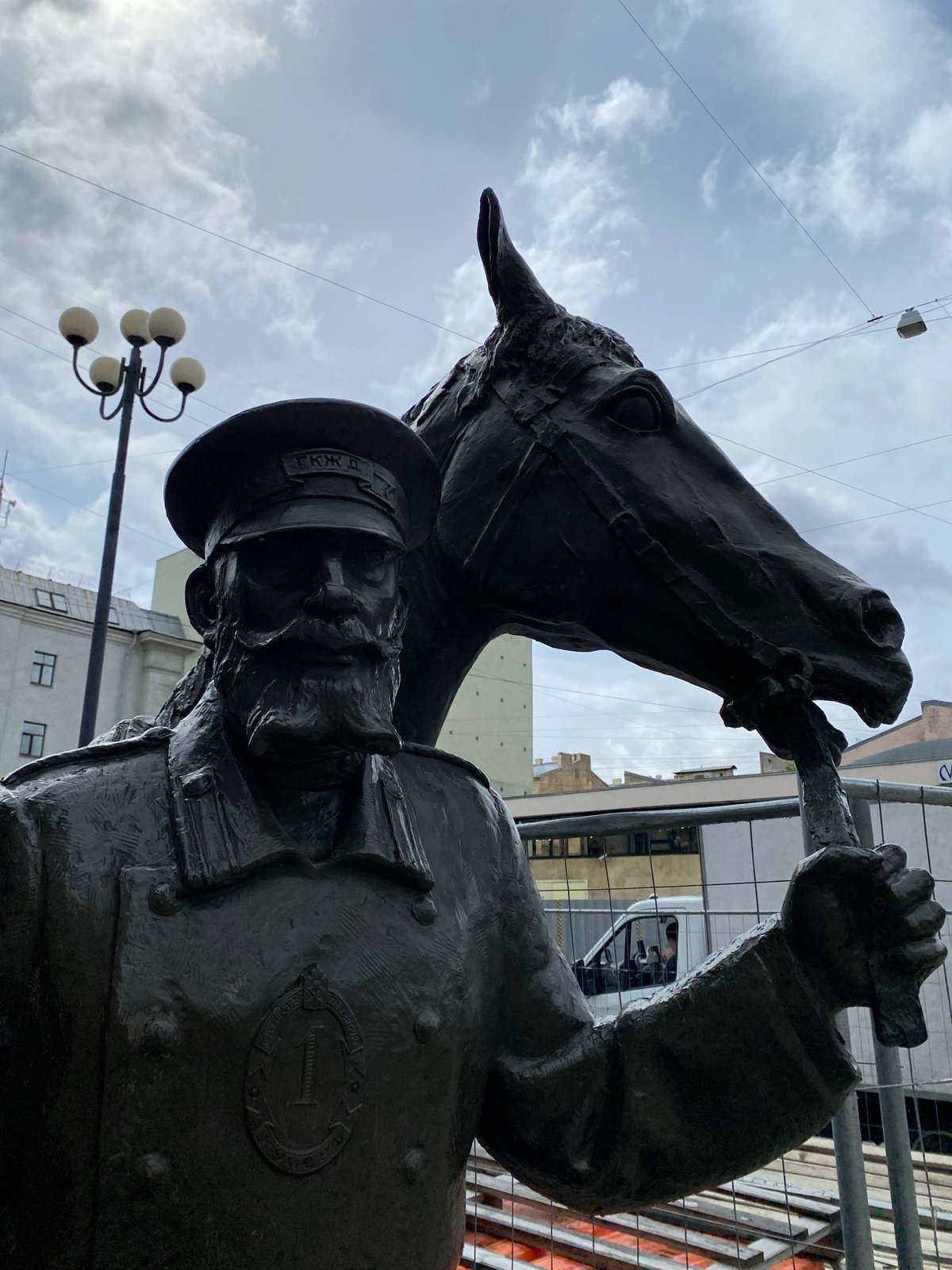 Morning scenes capture historic statues and office work in St. Petersburg