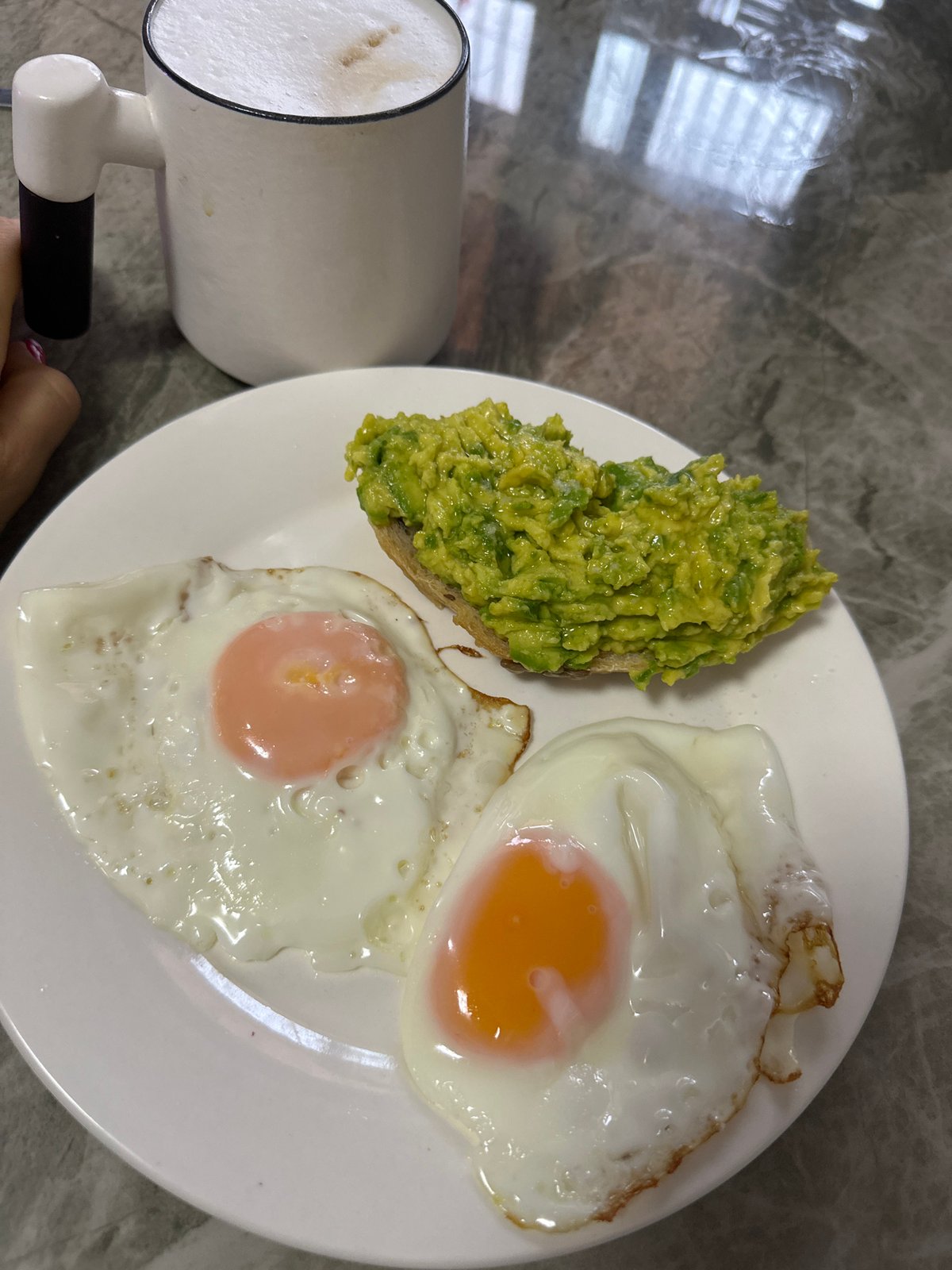 Morning routine captured in Nha Trang: breakfast, pets, rain