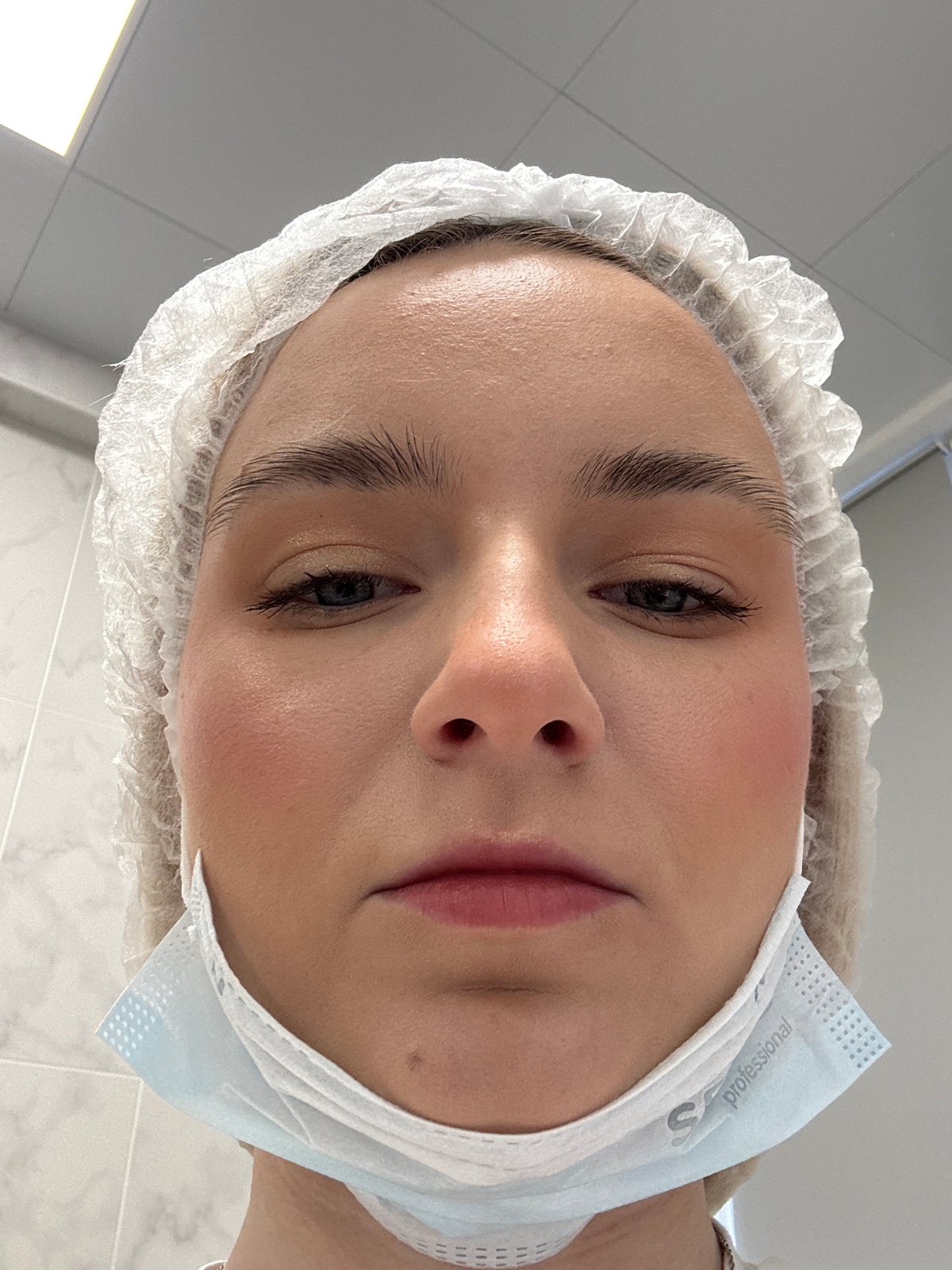 Healthcare worker photographed during early morning shift in Saint Petersburg