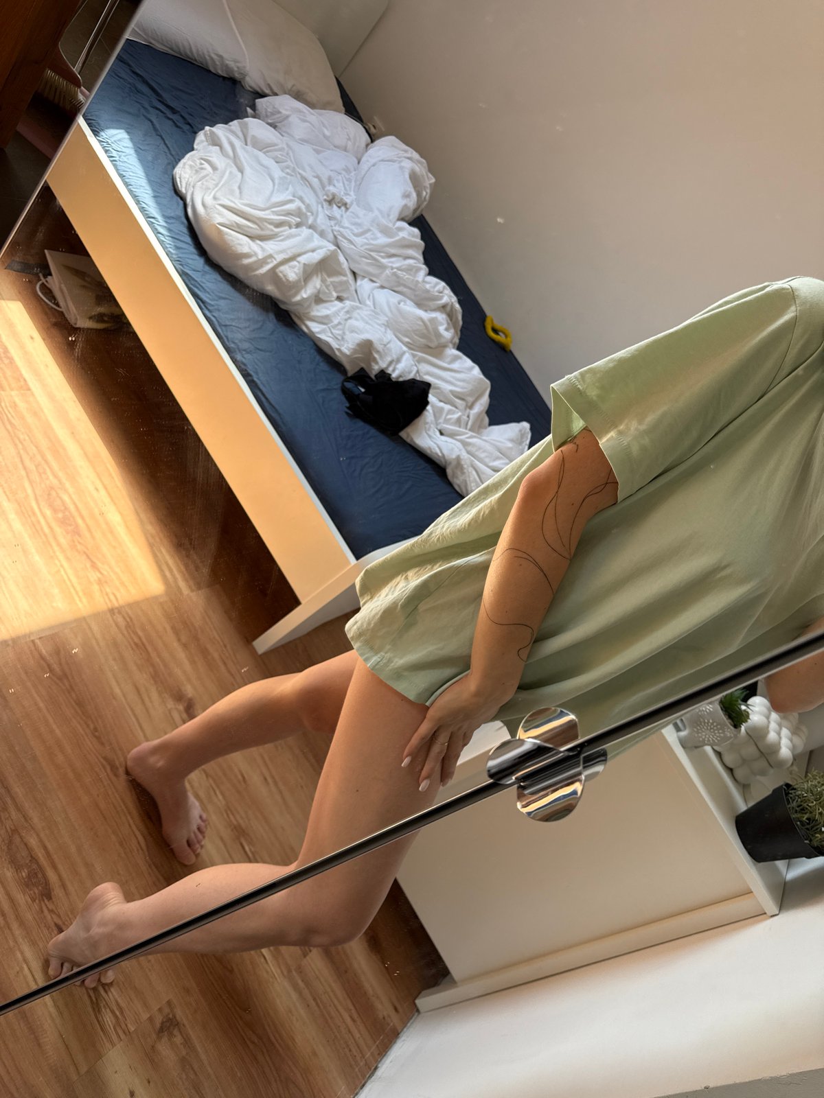 Person takes selfies in Sofia bedroom